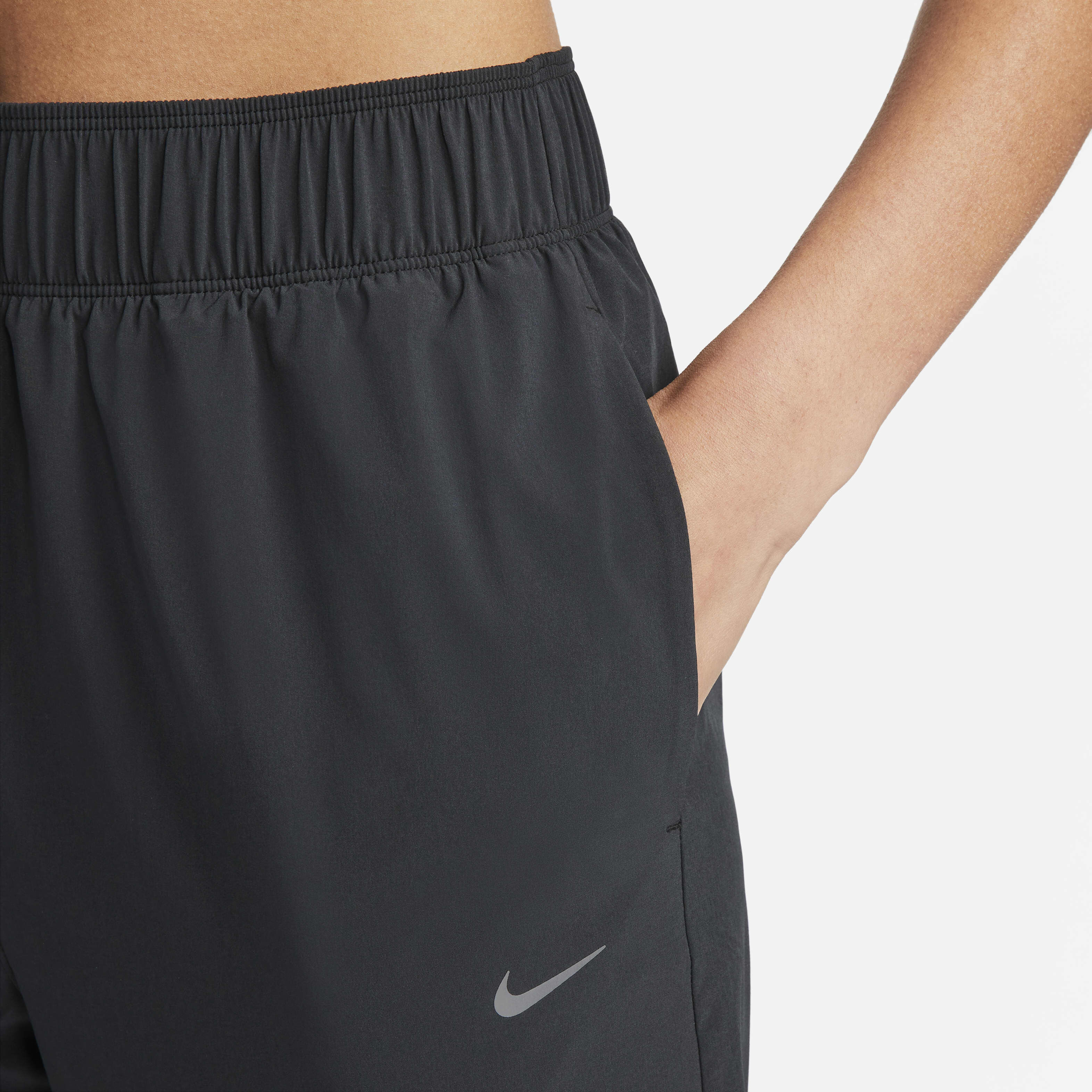 Buy Nike Dri FIT Fast Women s Mid Rise 7 8 Running Trousers Nike Saudi Official