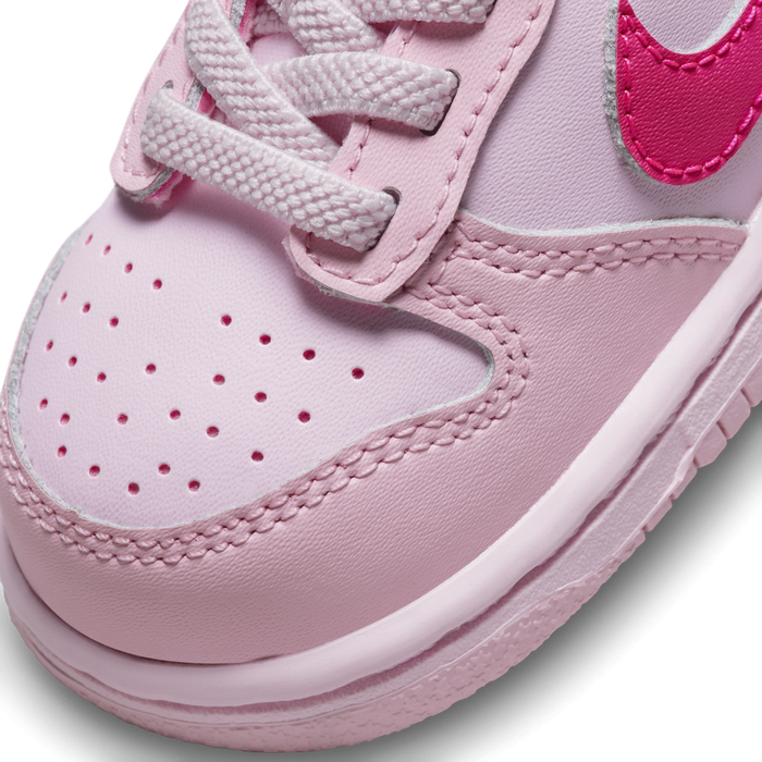 Pink baby nike sales shoes
