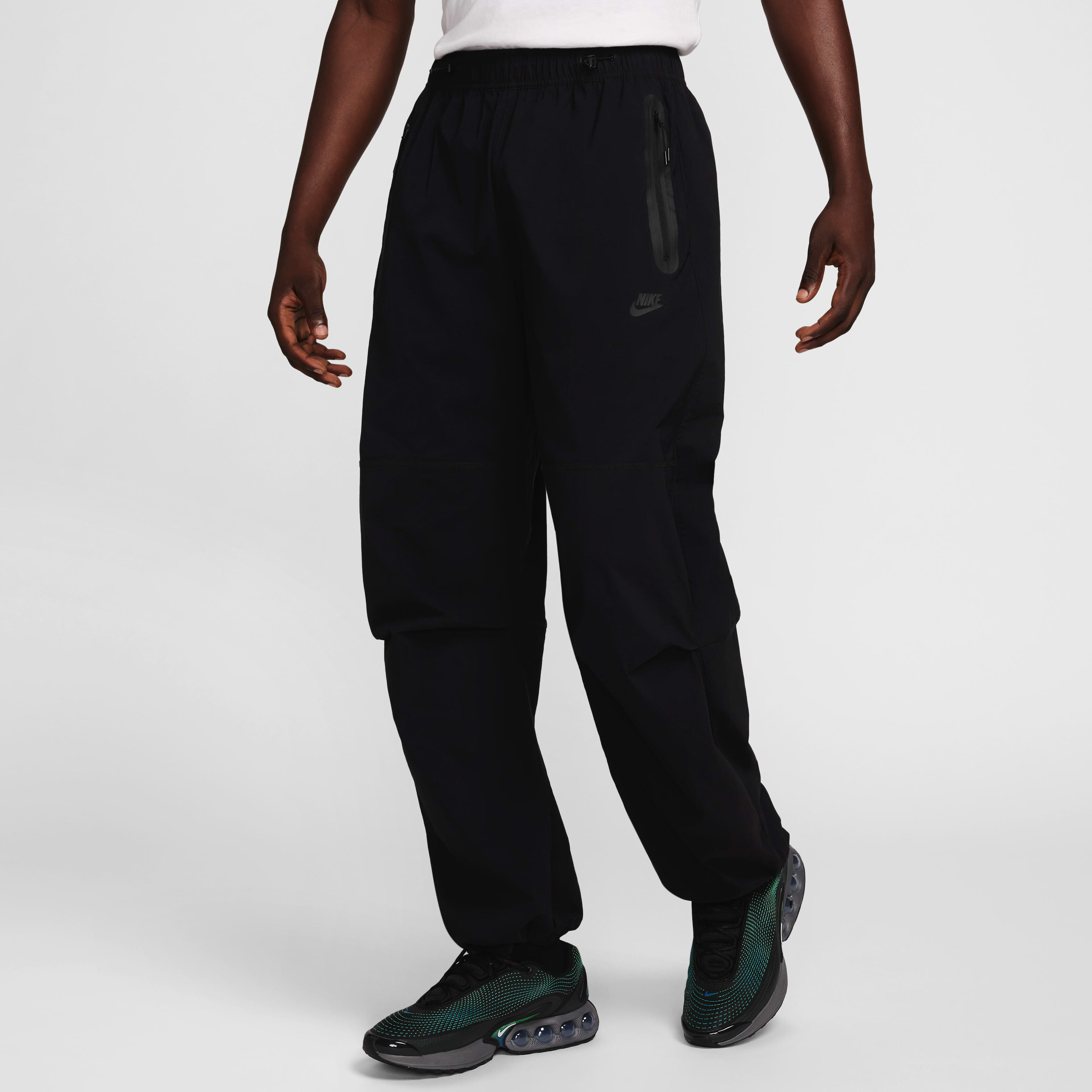 Nike sportswear men's woven pants online