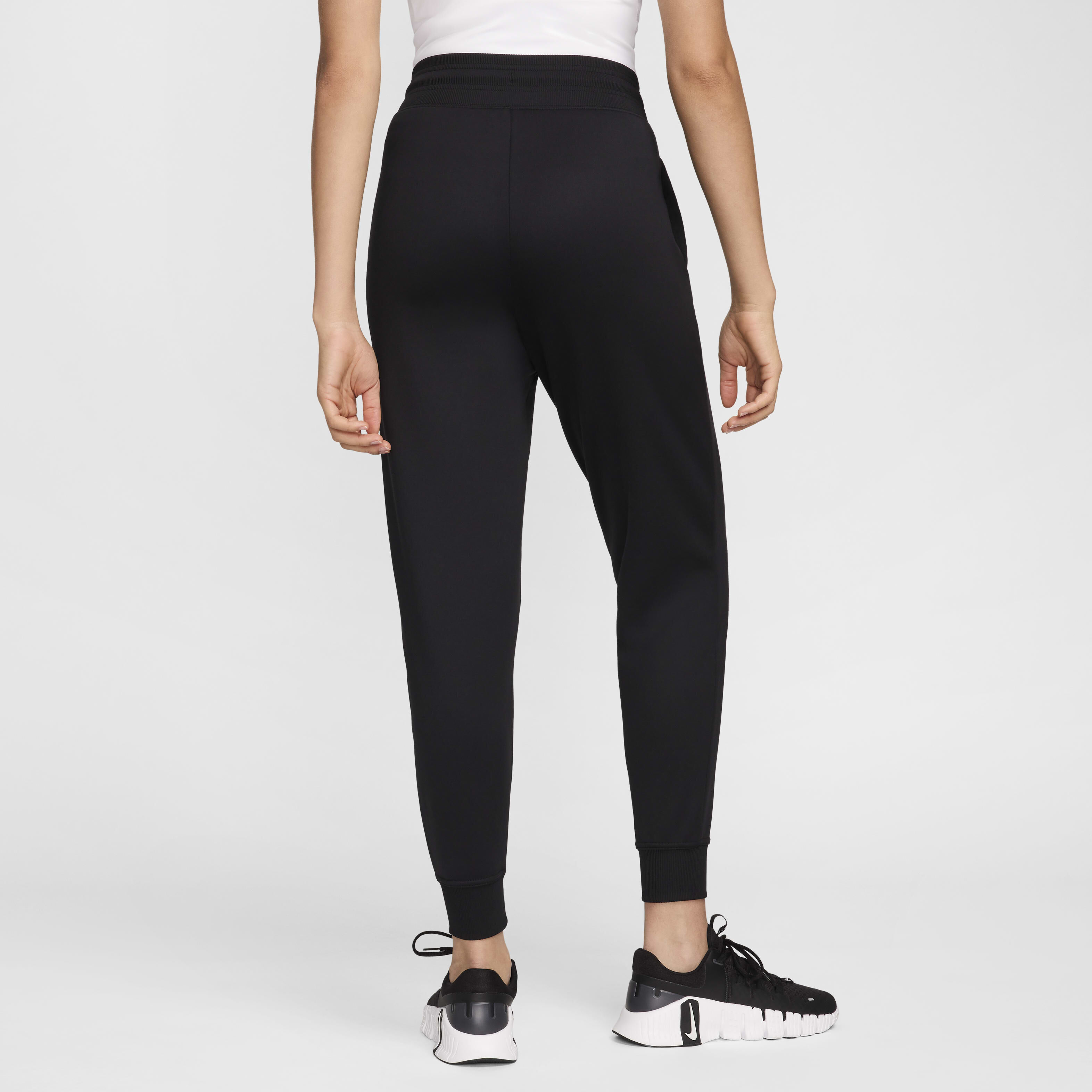 Buy Nike Therma FIT One Women s High Waisted 7 8 Trousers Black White Nike Saudi Official