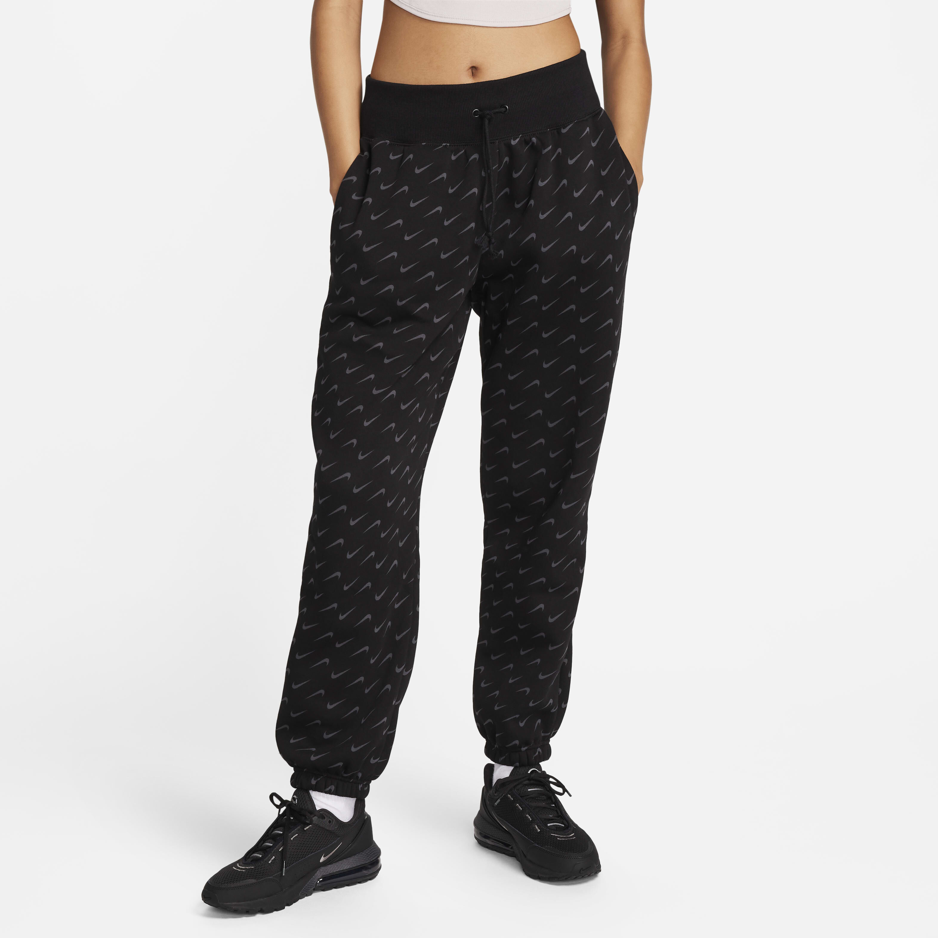 Buy Nike Sportswear Phoenix Fleece Women s Oversized Printed Tracksuit Bottoms Nike Saudi Official