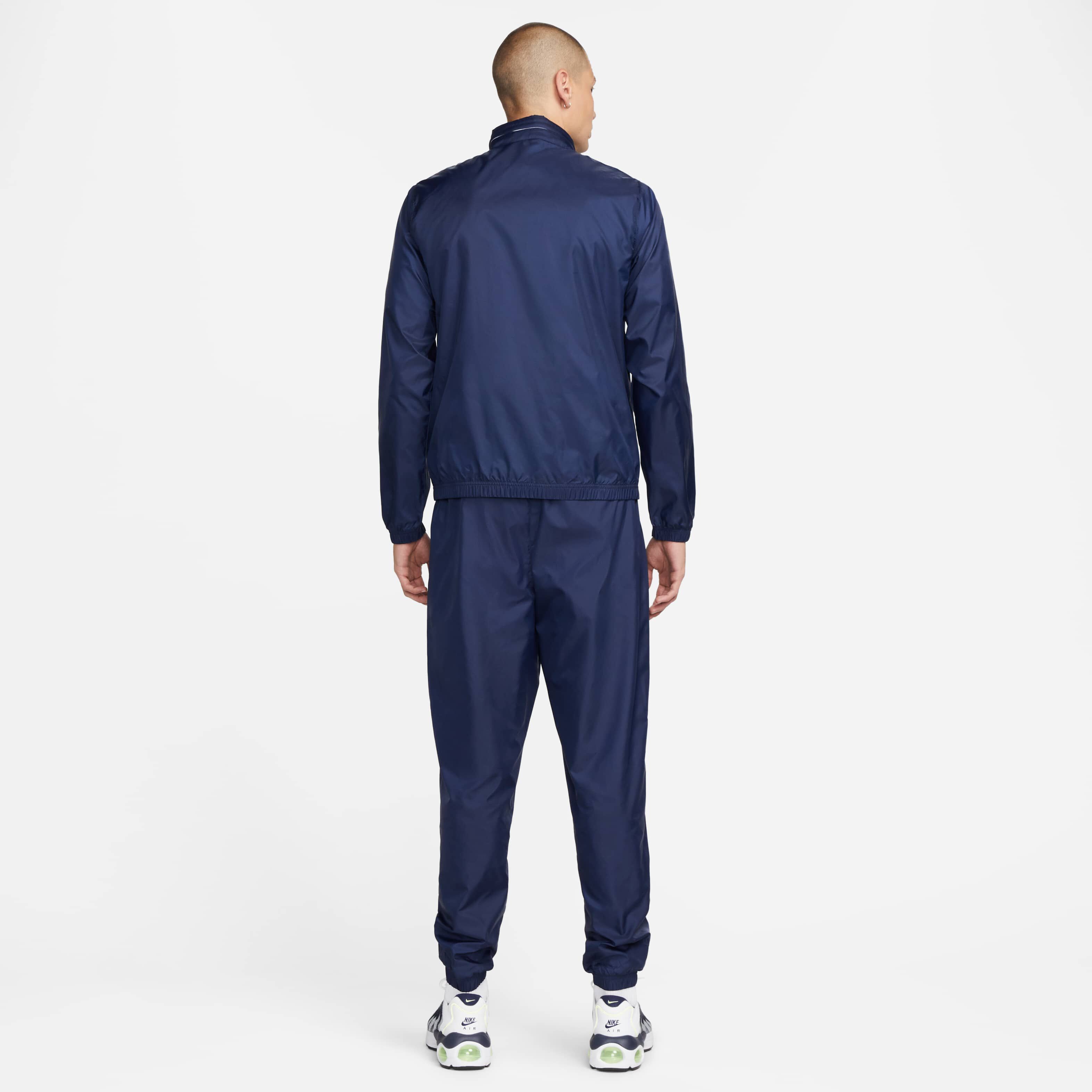 Buy Nike Sportswear Club Men s Lined Woven Tracksuit Nike Saudi Official