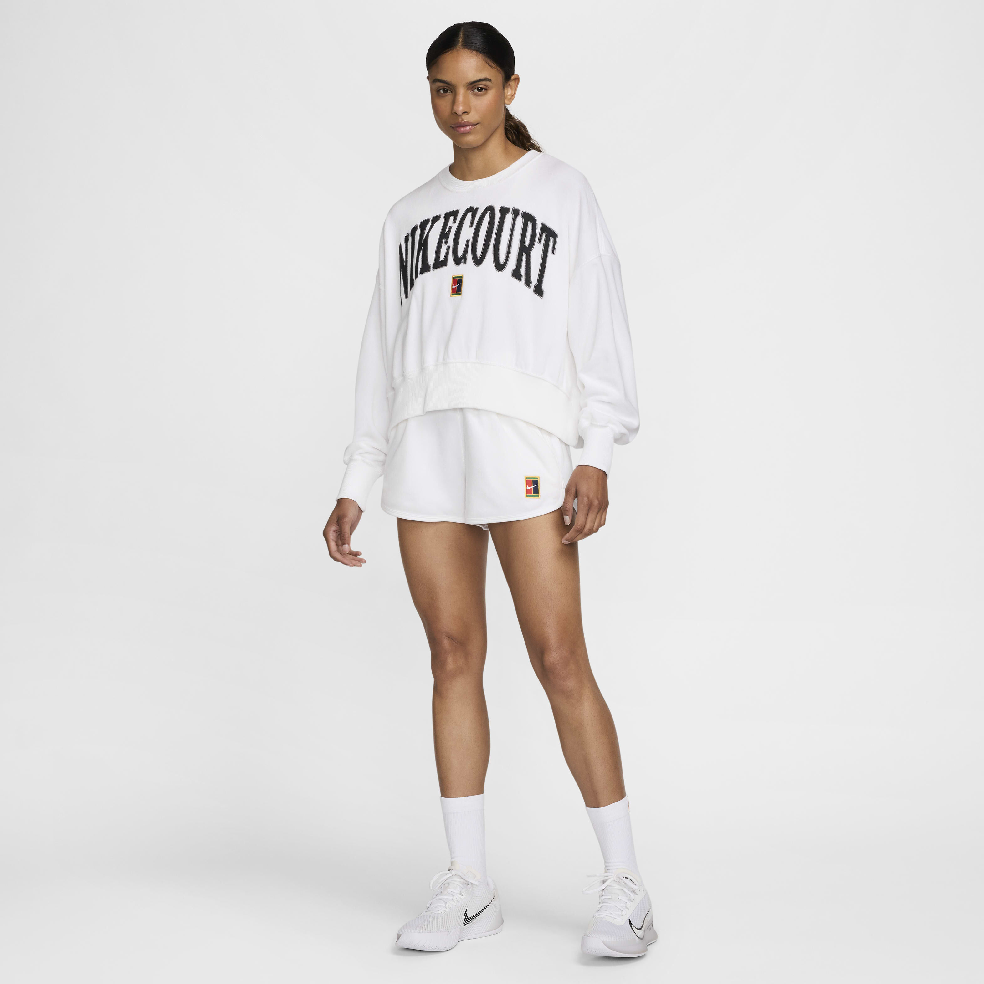 Buy NikeCourt Heritage Women s Over Oversized Crew Neck Graphic Tennis Sweatshirt Nike Saudi Official