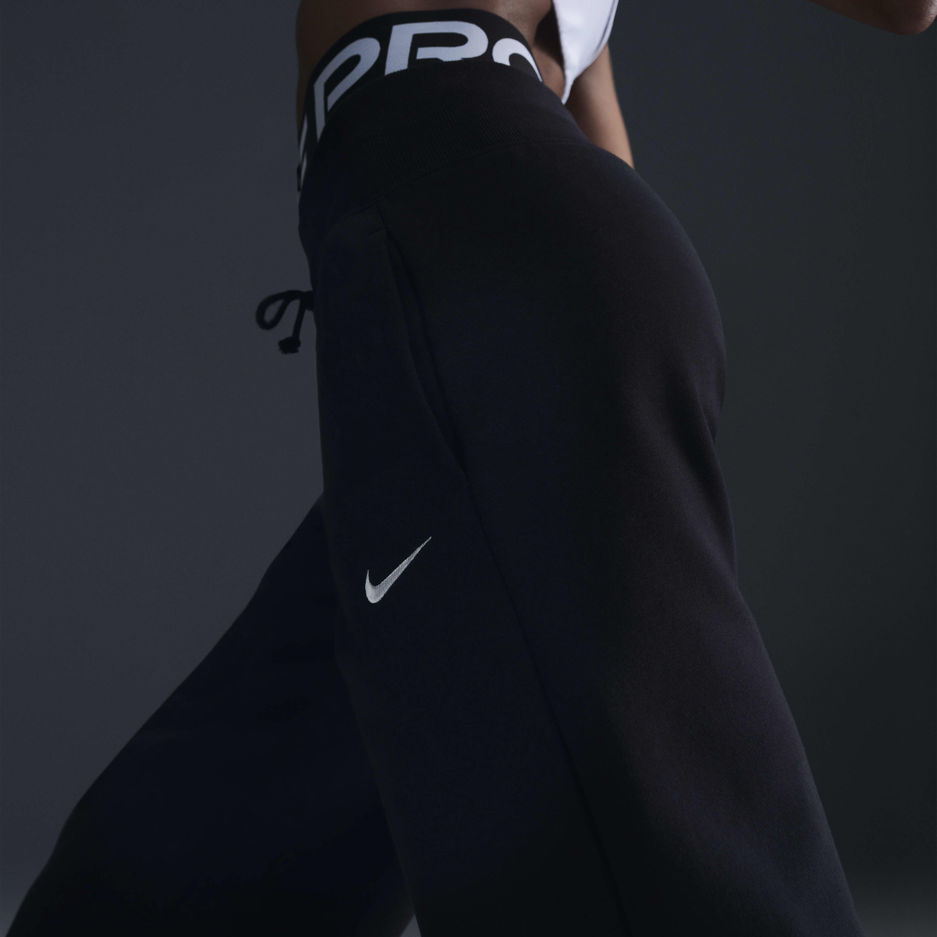 Buy Nike Sportswear Phoenix Fleece Women s High Waisted Wide Leg Tracksuit Bottoms Nike Saudi Official