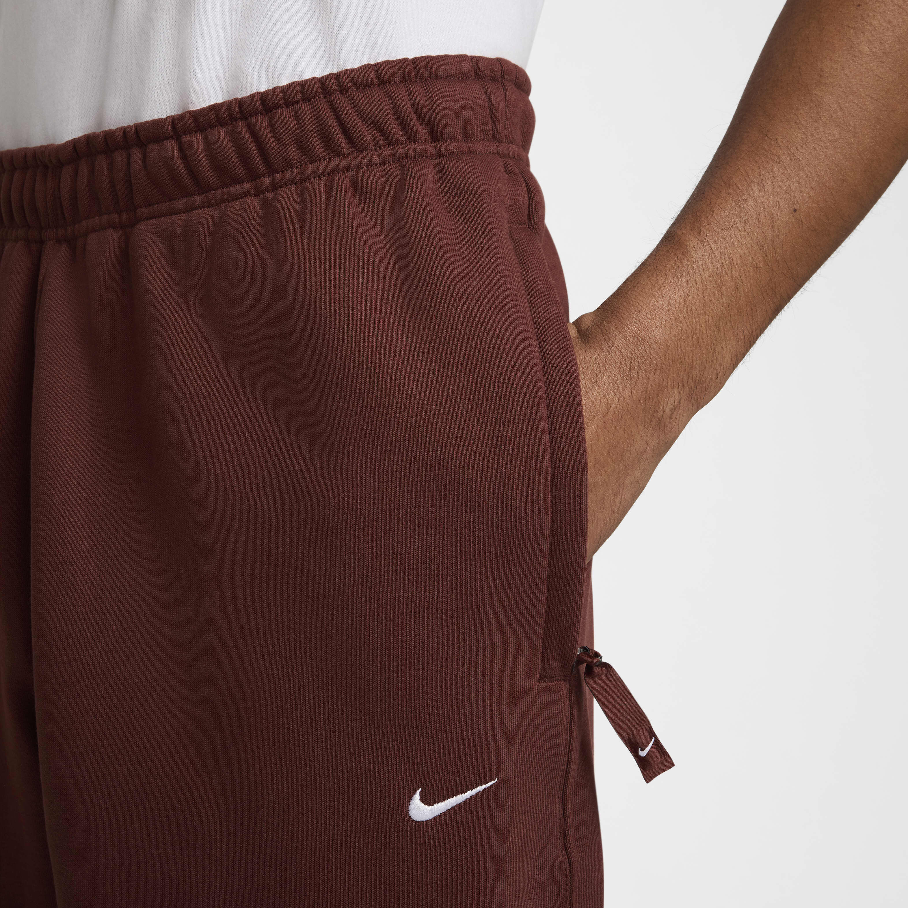 Buy Nike Solo Swoosh Men s Fleece Trousers Nike Saudi Official
