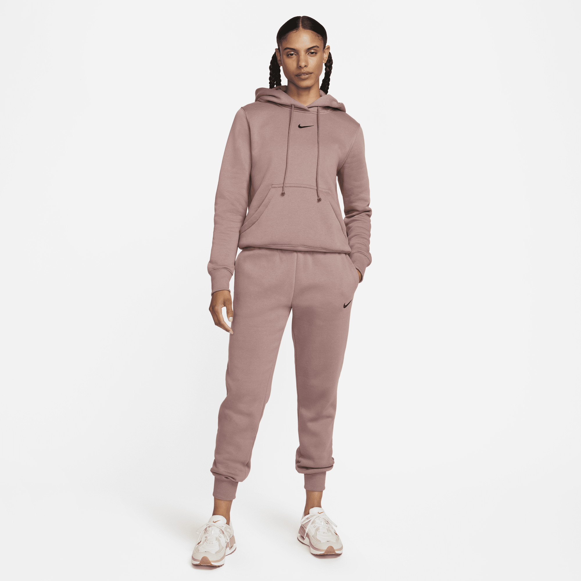 Shop Sportswear Phoenix Fleece Women s Mid Rise Tracksuit Bottoms