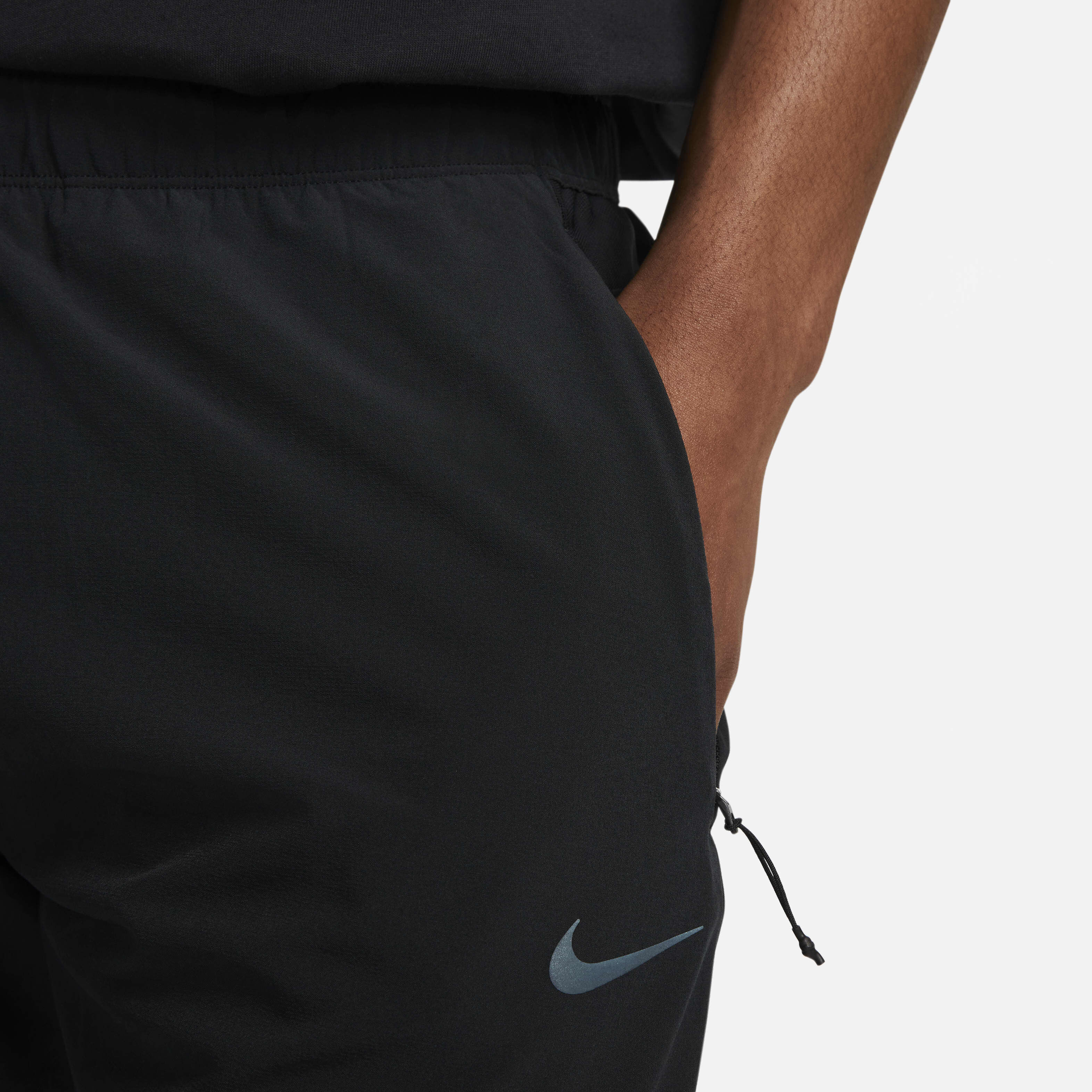 Buy Nike Dri FIT Running Division Phenom Men s Slim Fit Running Trousers Nike Saudi Official