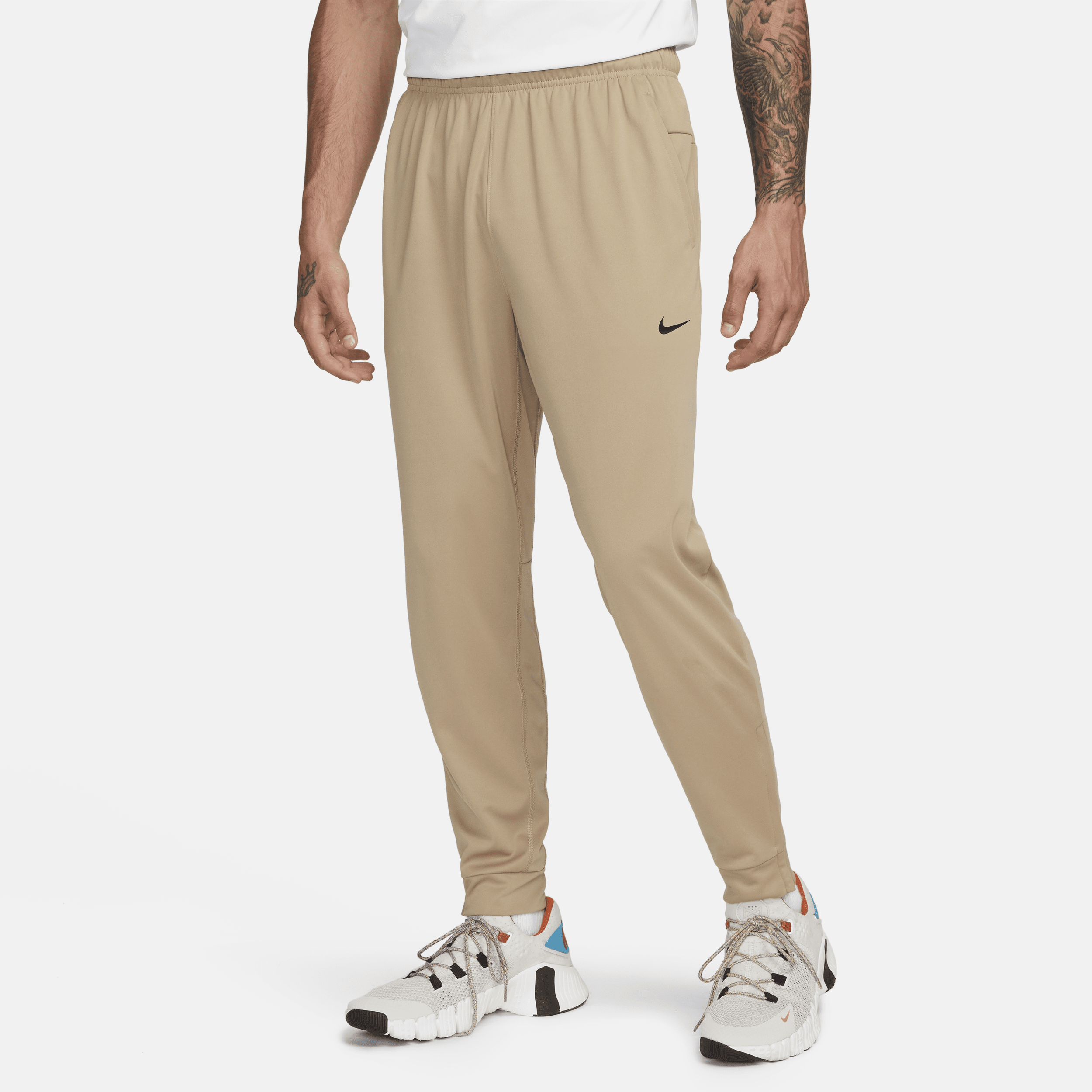 Shop Totality Men s Dri FIT Tapered Versatile Trousers Nike KSA