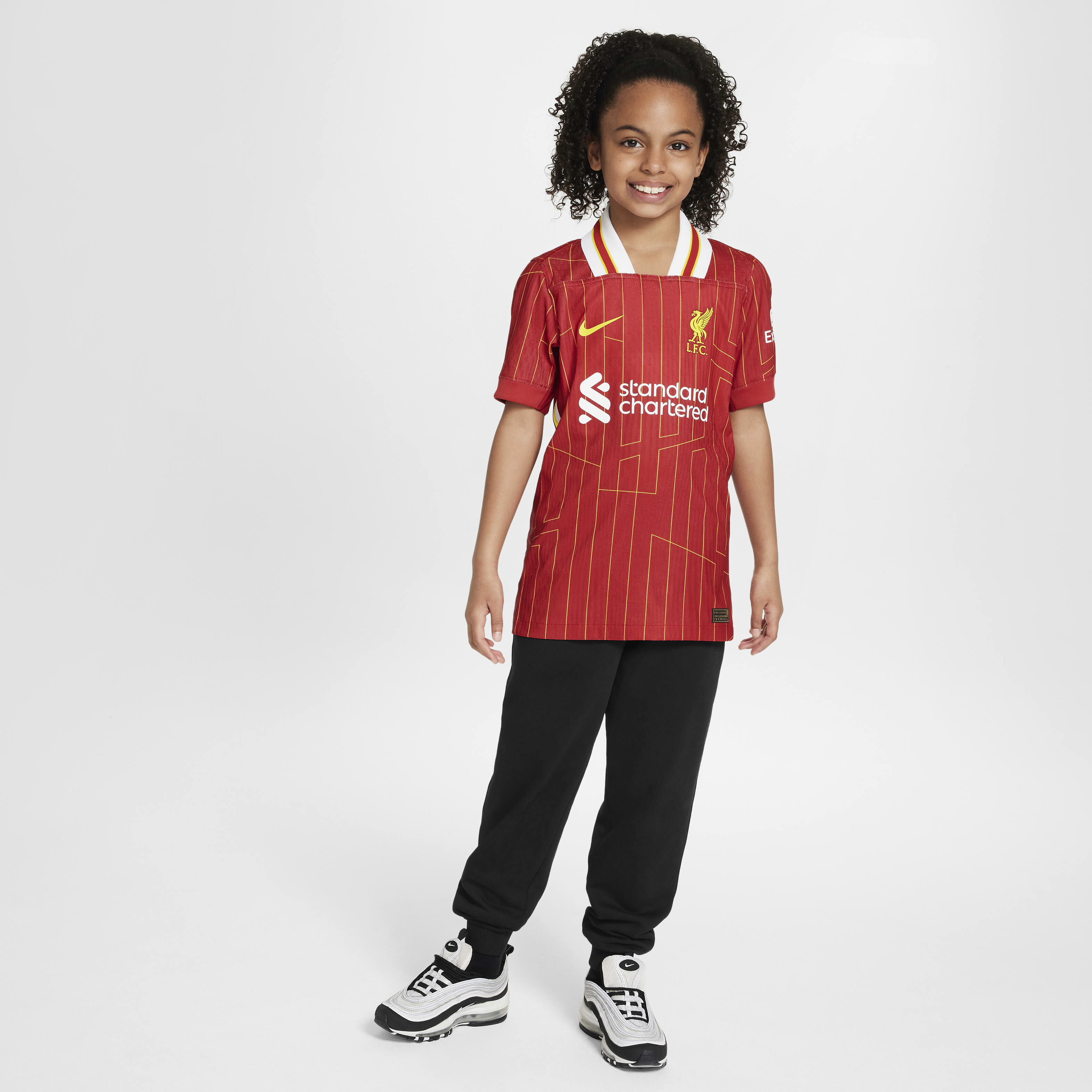 Girl wearing liverpool shirt shop