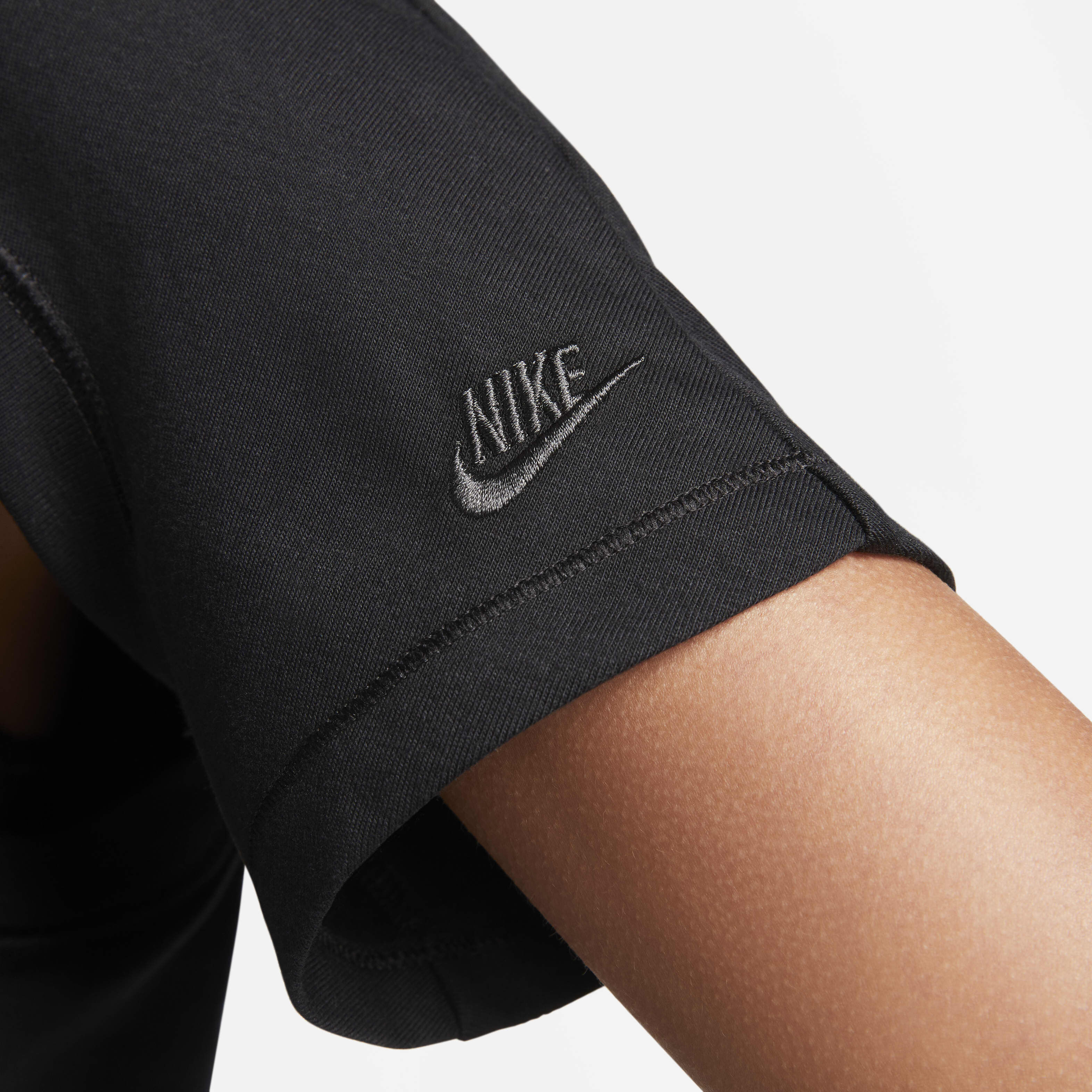 Buy Nike Sportswear Tech Pack Women s Dri FIT ADV Short Sleeve Bodysuit Black Anthracite Nike Saudi Official