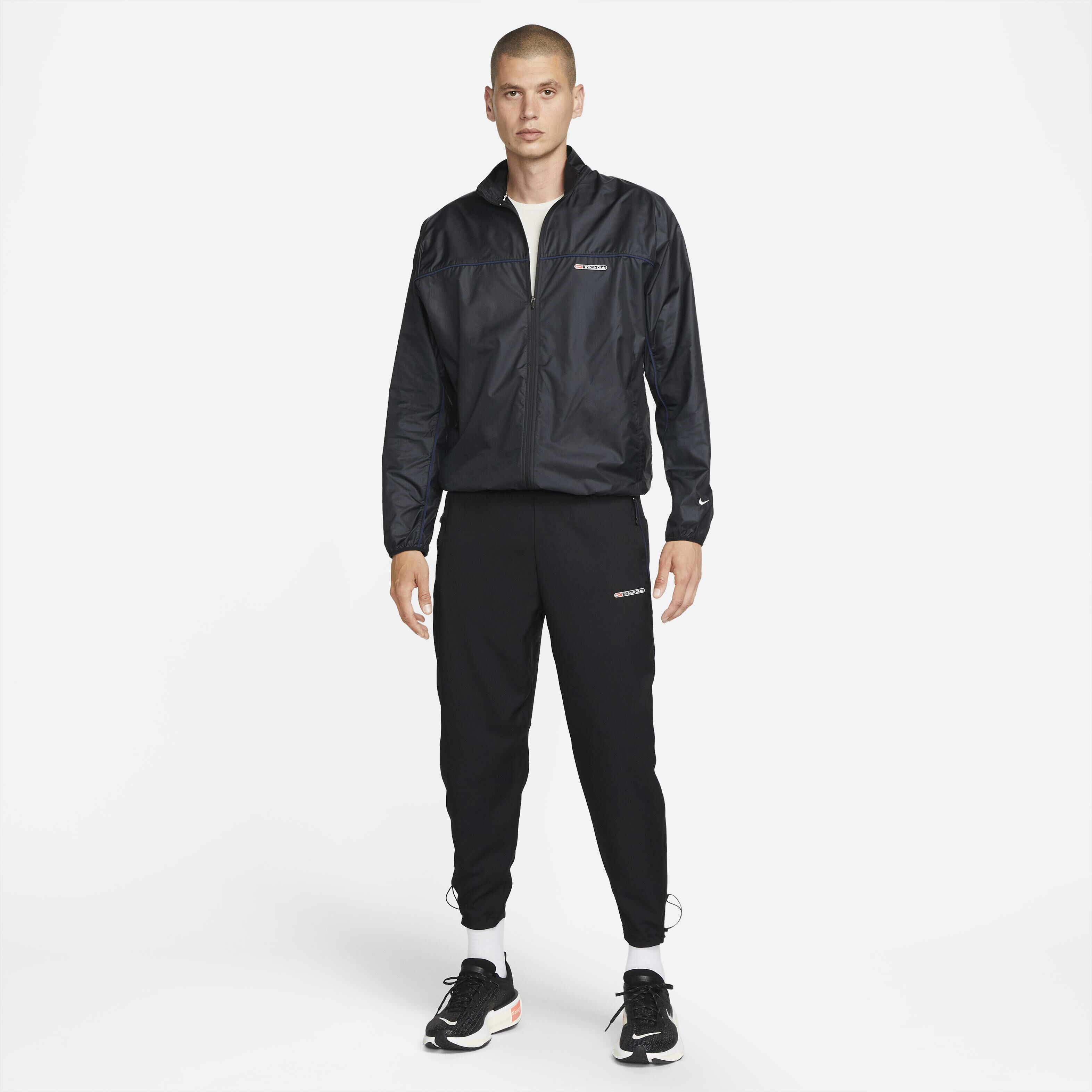 nike track pants and shirt