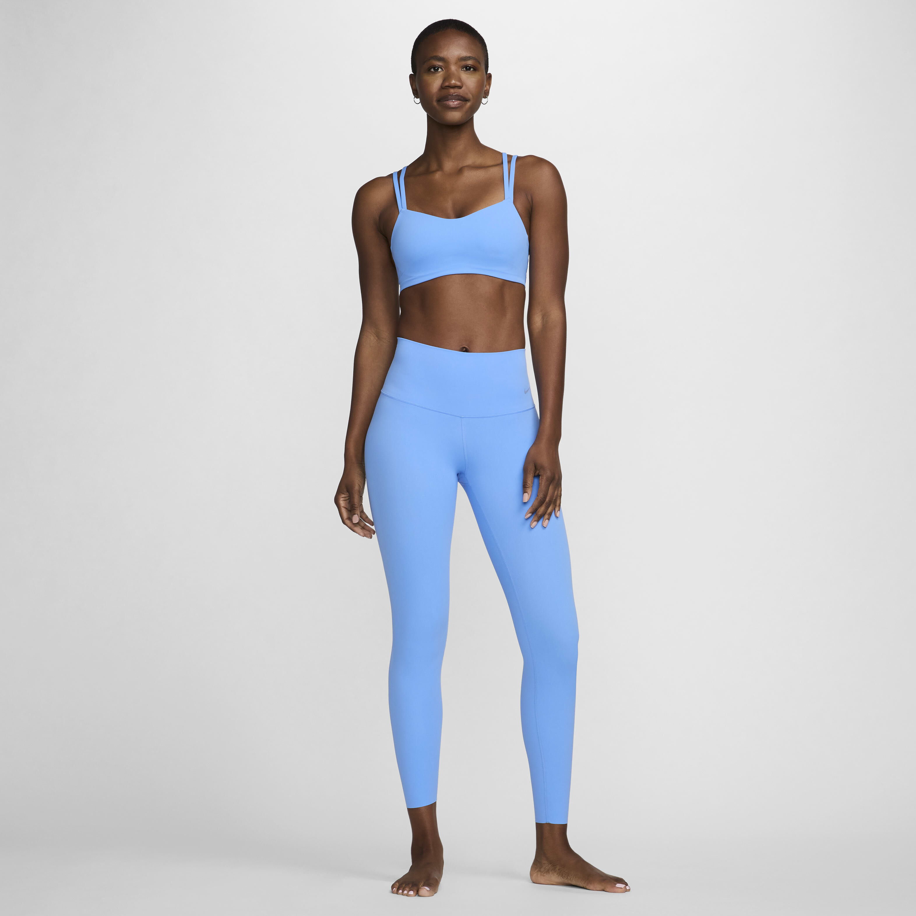Buy Nike Zenvy Strappy Women s Light Support Padded Sports Bra University Blue White Nike Saudi Official