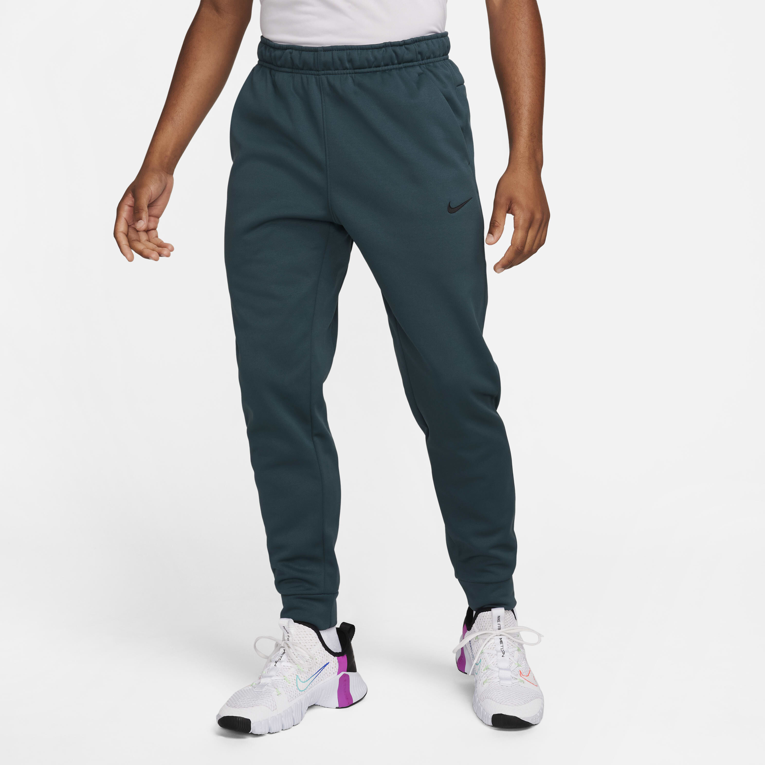 Buy Nike Therma Men s Therma FIT Tapered Fitness Trousers Obsidian Obsidian Black Nike Saudi Official