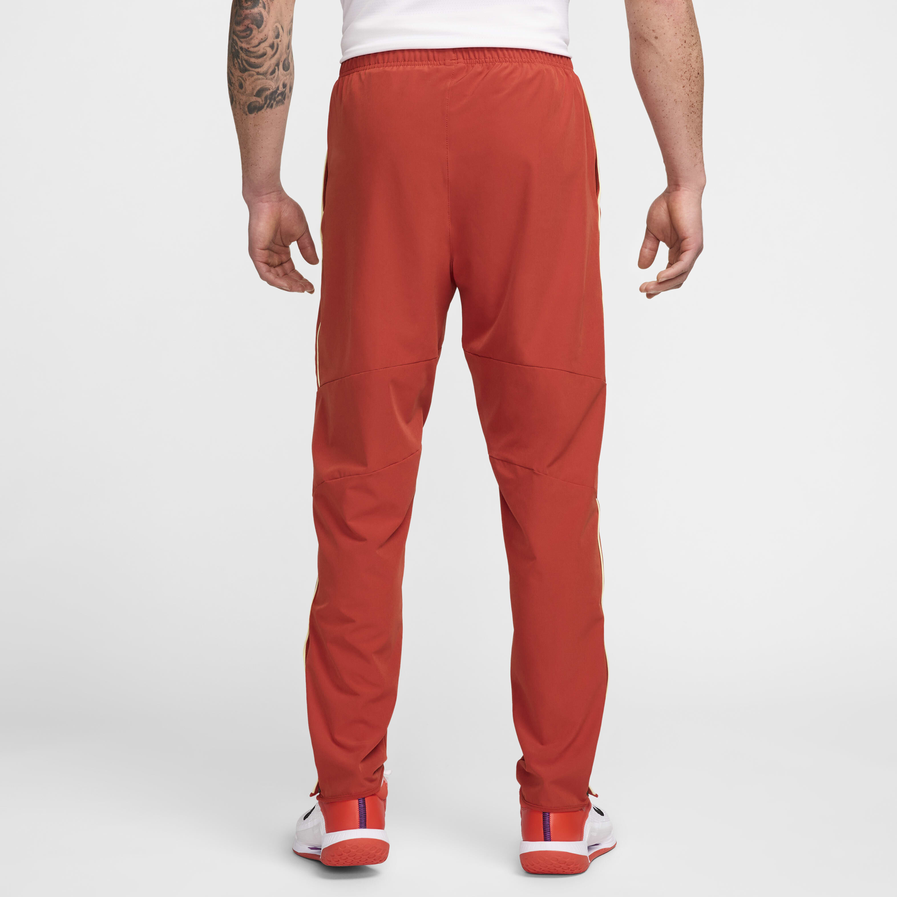 Buy NikeCourt Advantage Men s Dri FIT Tennis Trousers Dragon Red Life Lime White Nike Saudi Official