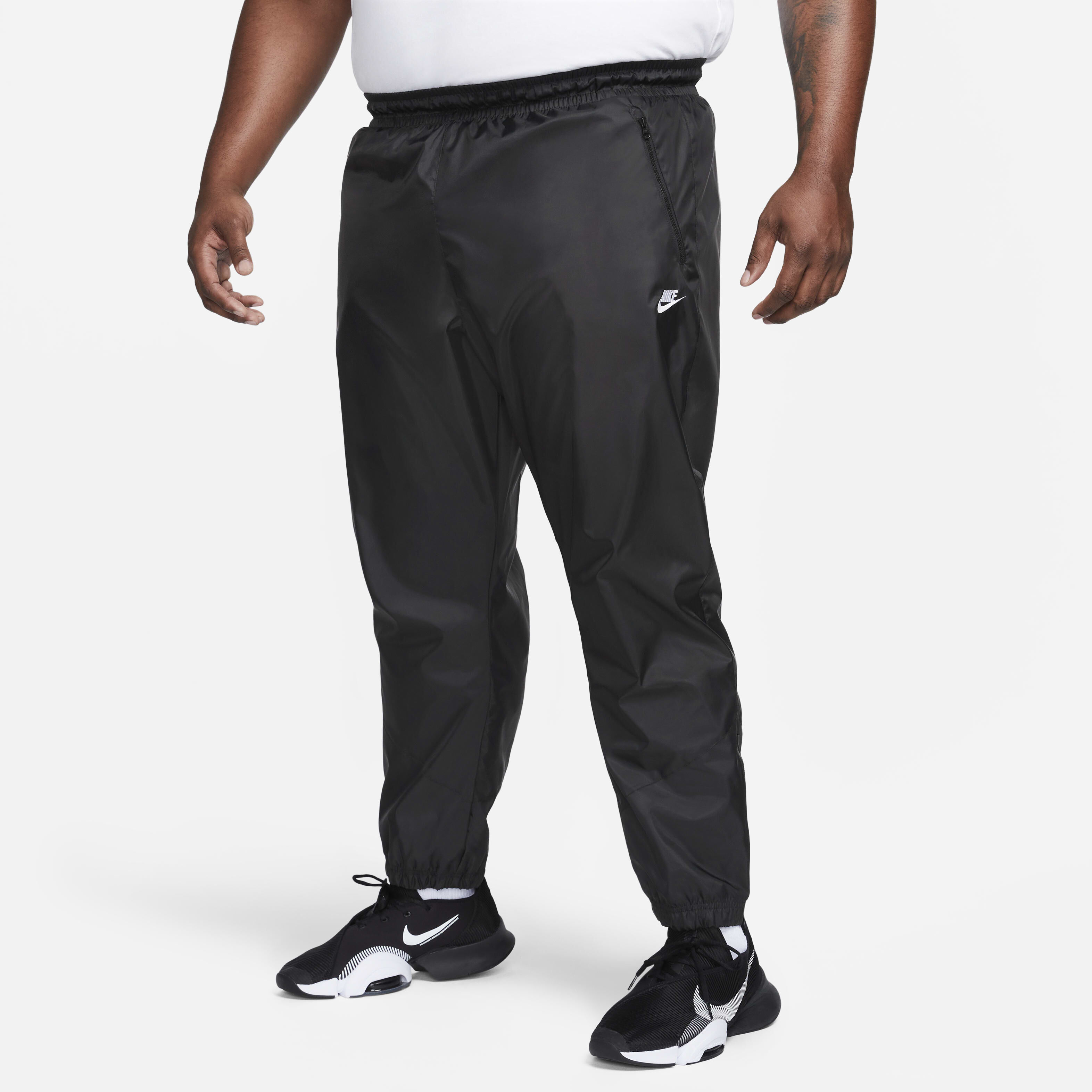 Buy Nike Windrunner Men s Woven Lined Trousers Nike Saudi Official