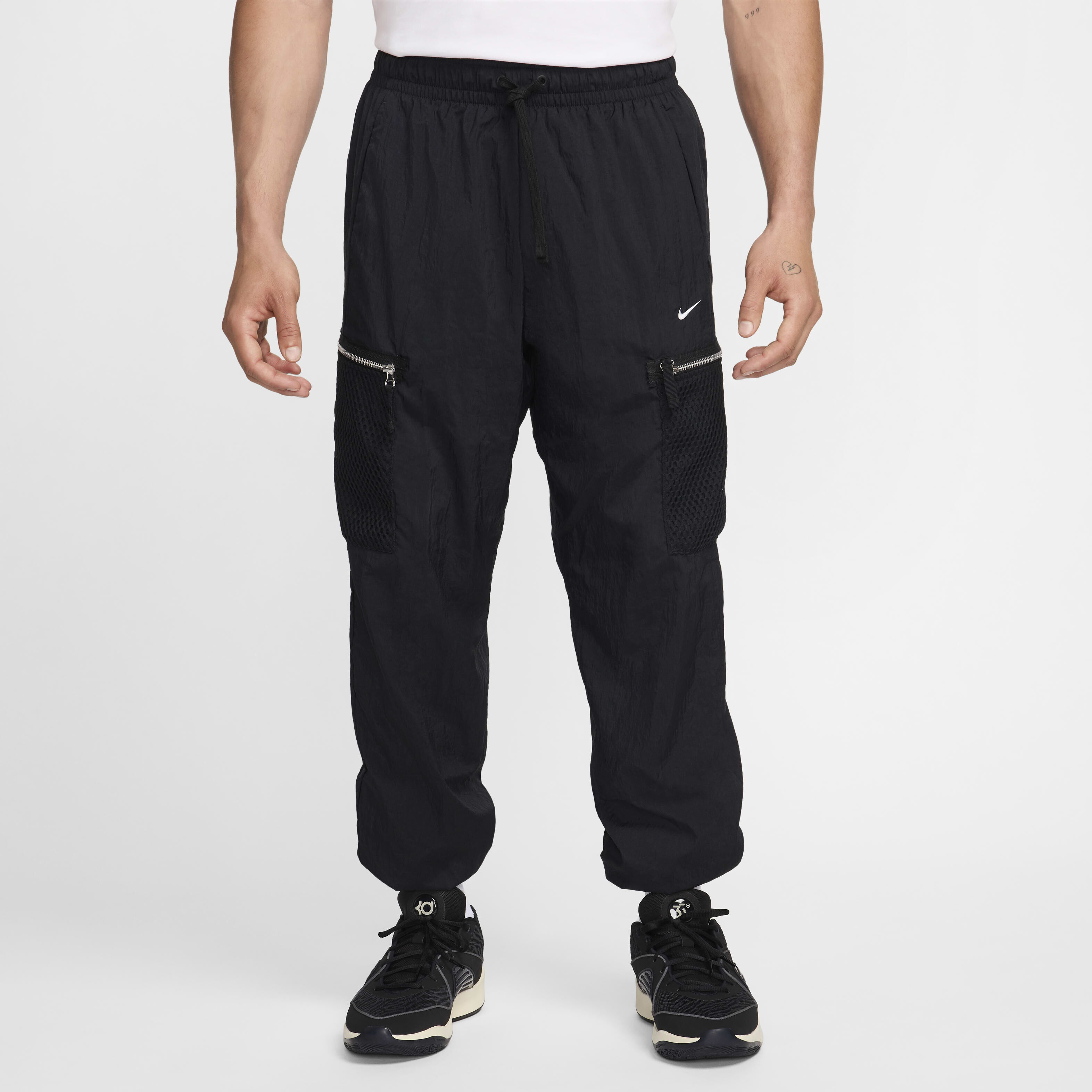 Buy Nike DNA Men s Repel Woven Basketball Cargo Trousers Black White Nike Saudi Official