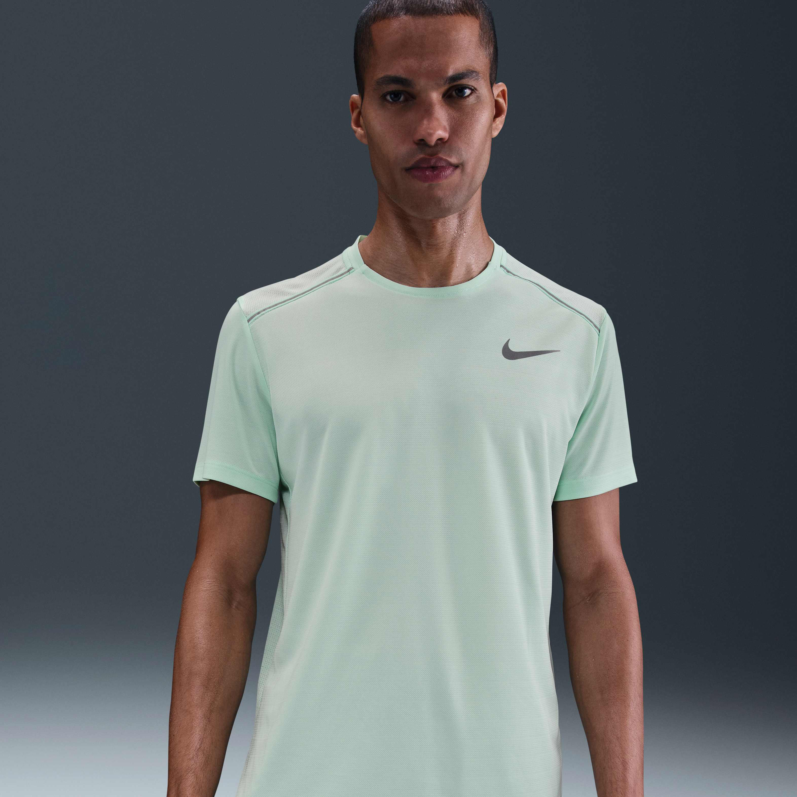 mint green nike running top