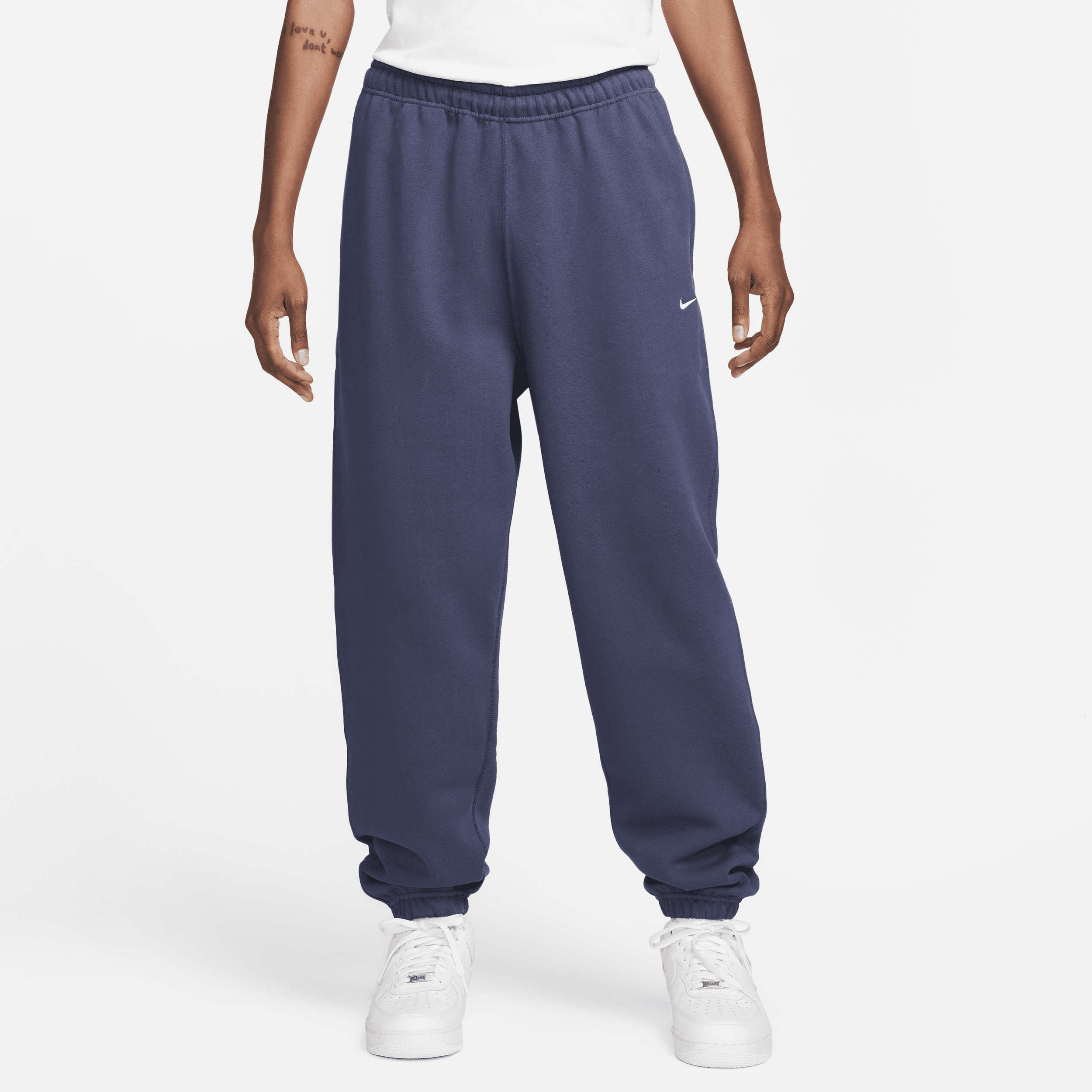 Nike sportswear sales fleece trousers