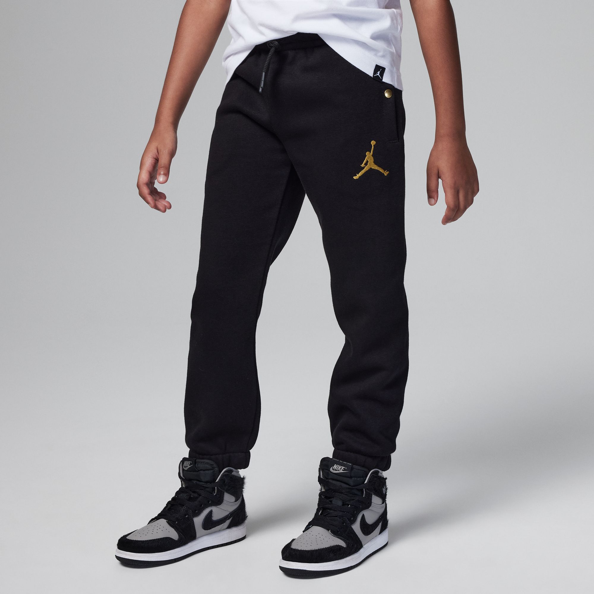 Nike black 2025 and gold sweatpants
