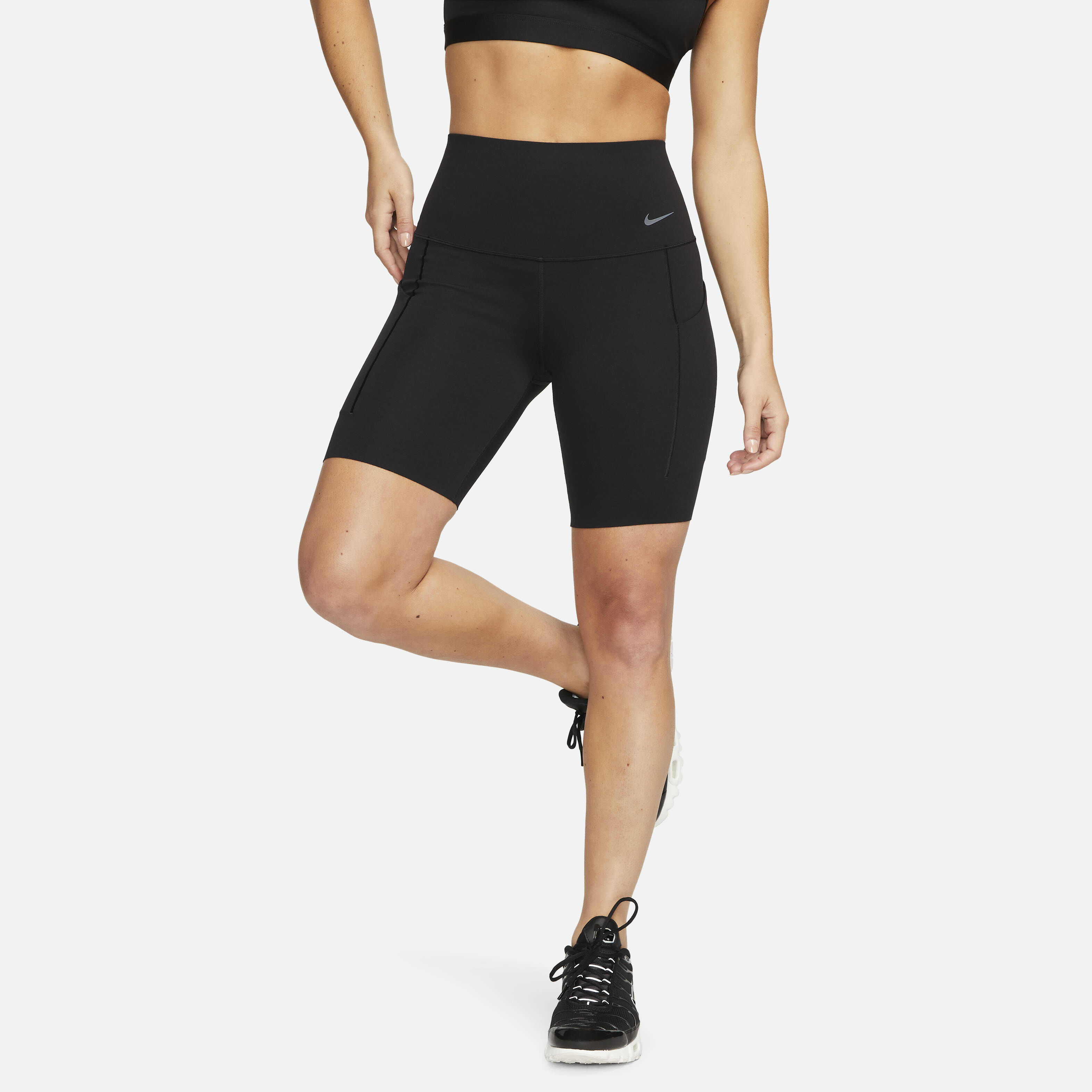 Buy Nike Universa Women s Medium Support High Waisted 20cm approx. Biker Shorts with Pockets Nike Saudi Official