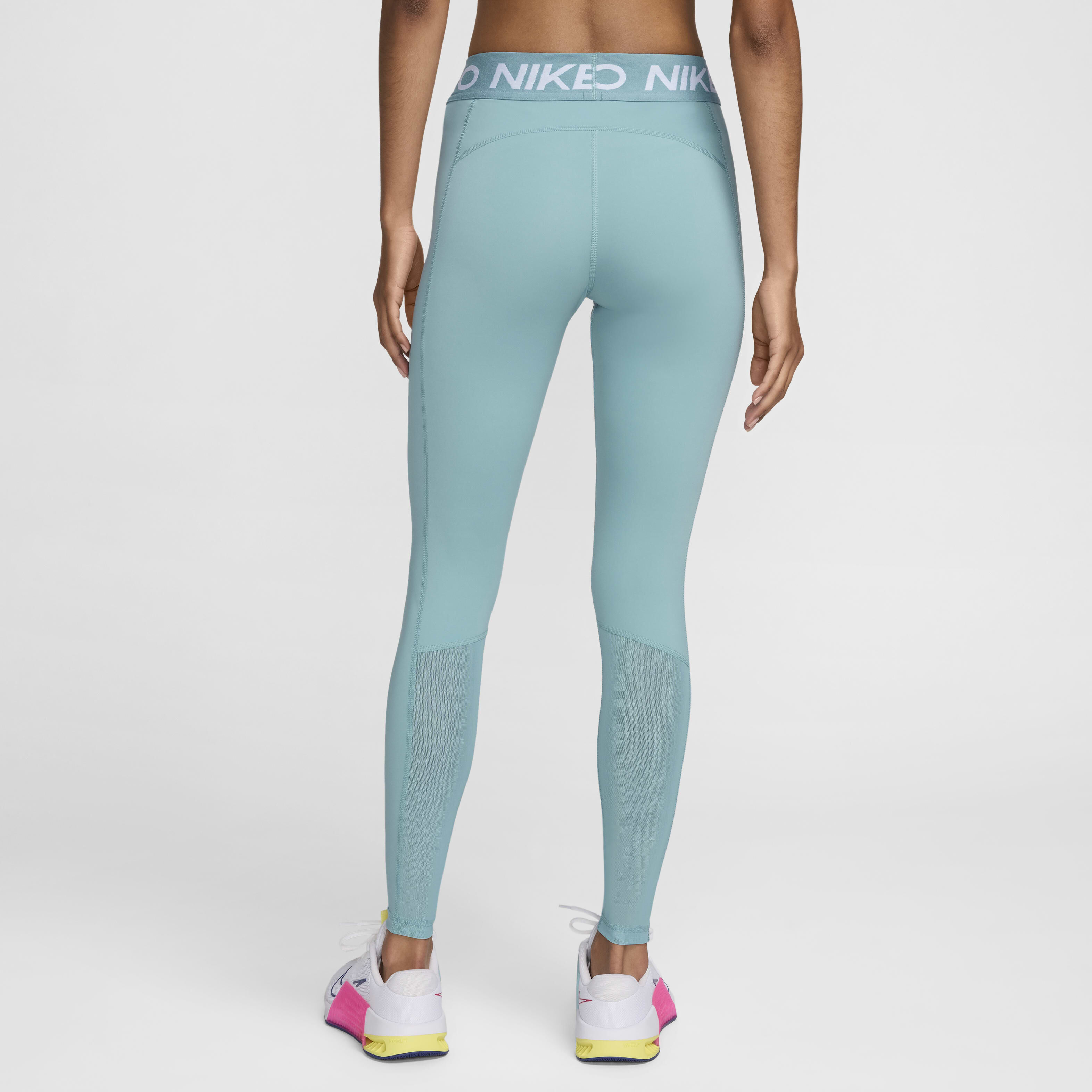 Buy Nike Pro Women s Mid Rise Mesh Panelled Leggings Denim Turquoise White Nike Saudi Official