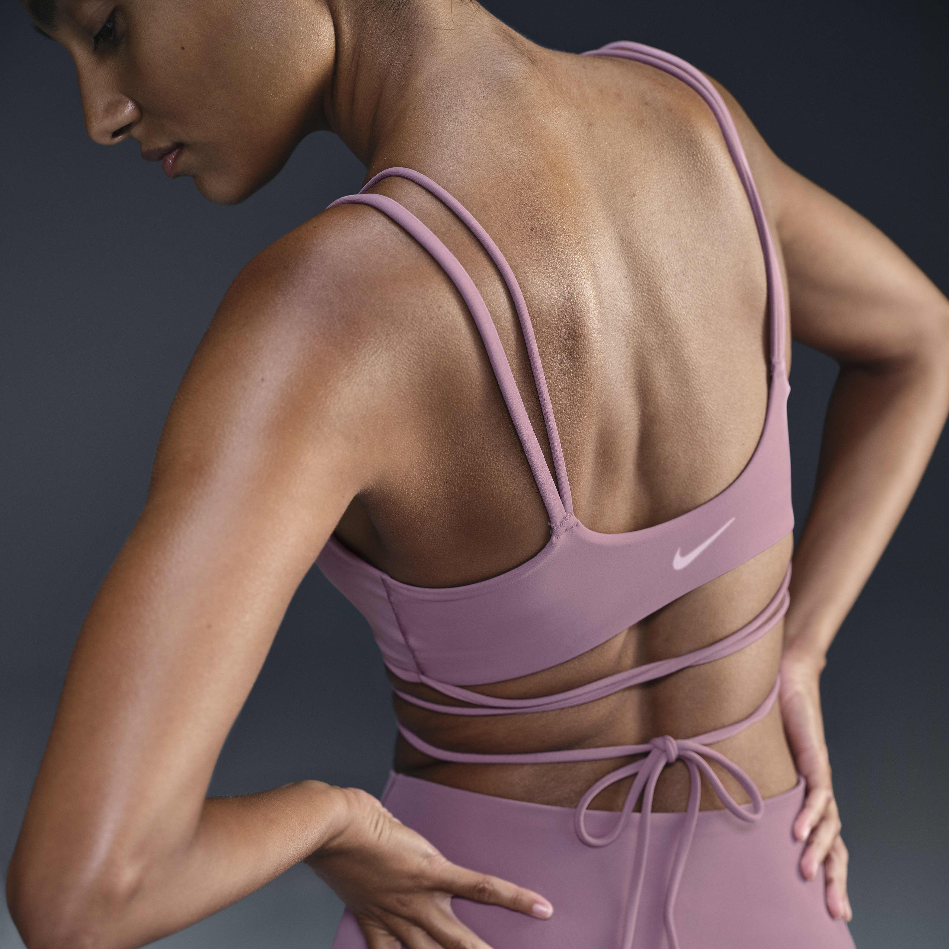 Buy Nike Zenvy Strappy Wrap Women s Light Support Padded Sports Bra Plum Dust Plum Dust White Nike Saudi Official