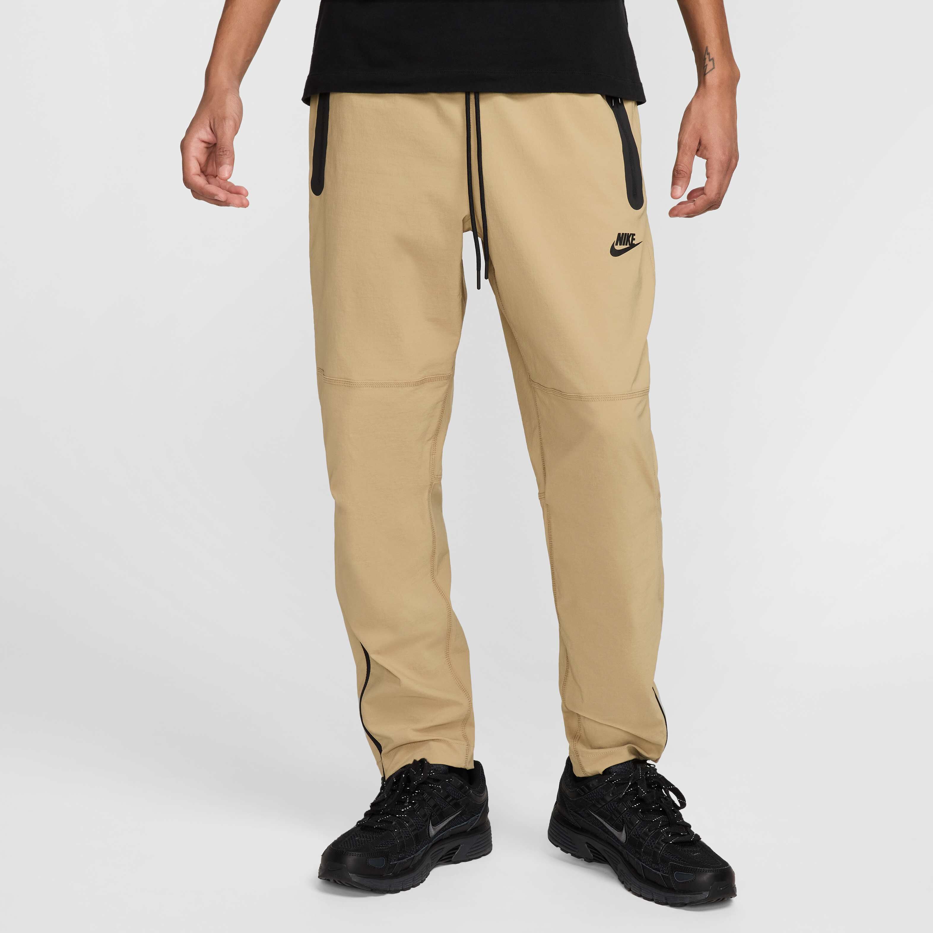 Buy Nike Tech Men's Woven Trousers - Parachute Beige/Black