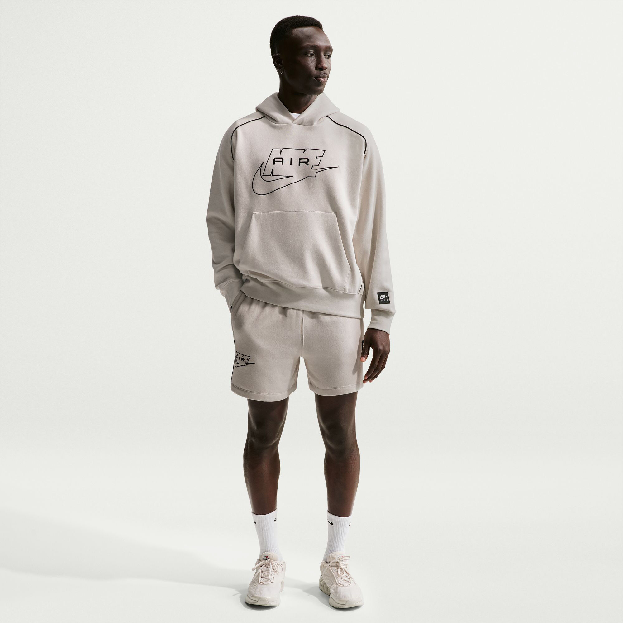 Buy Nike Air Men's Fleece Shorts - Light Bone/Black/Black @ Nike Saudi