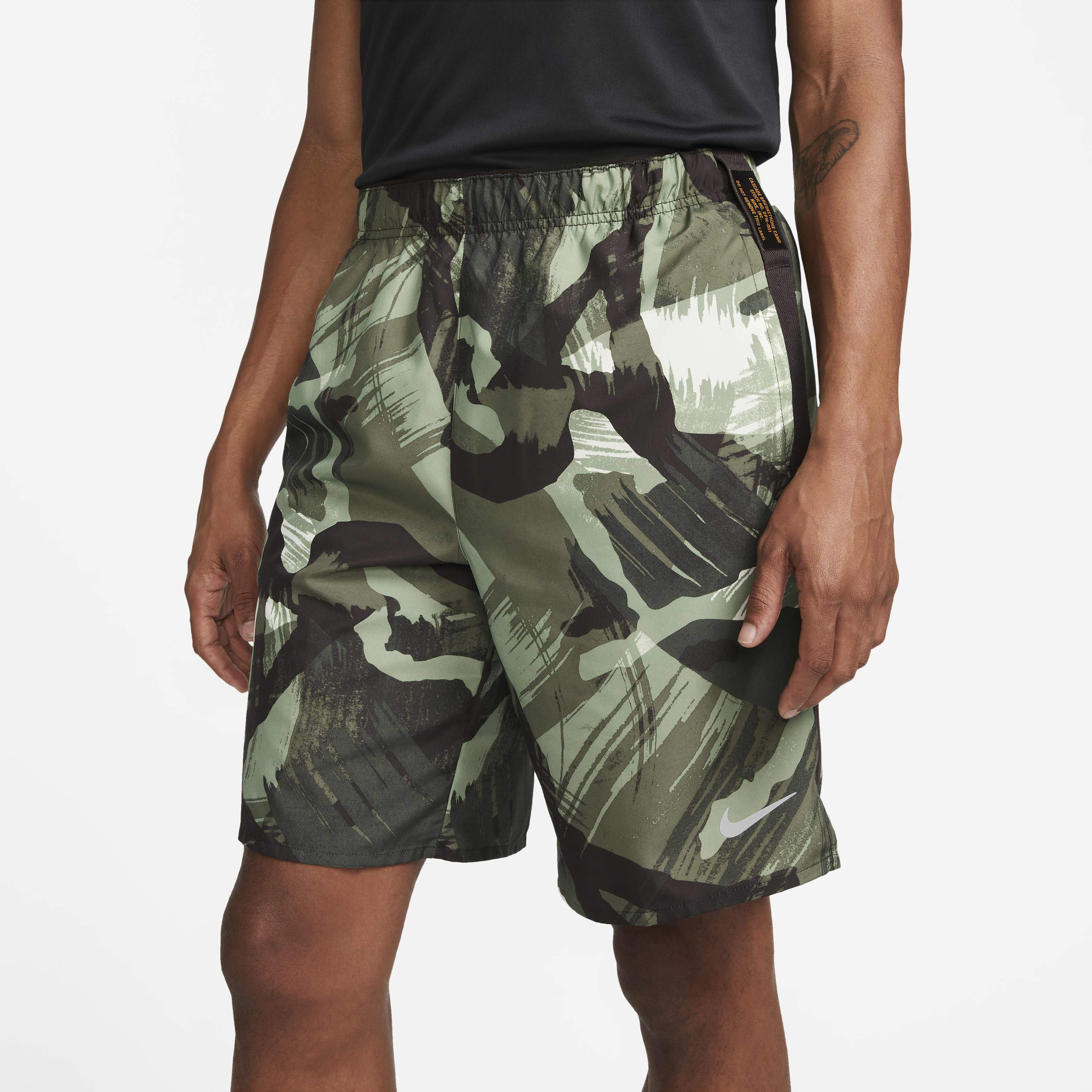 Buy Nike Dri FIT Challenger Men s 23cm approx. Unlined Versatile Shorts Oil Green Velvet Brown Nike Saudi Official
