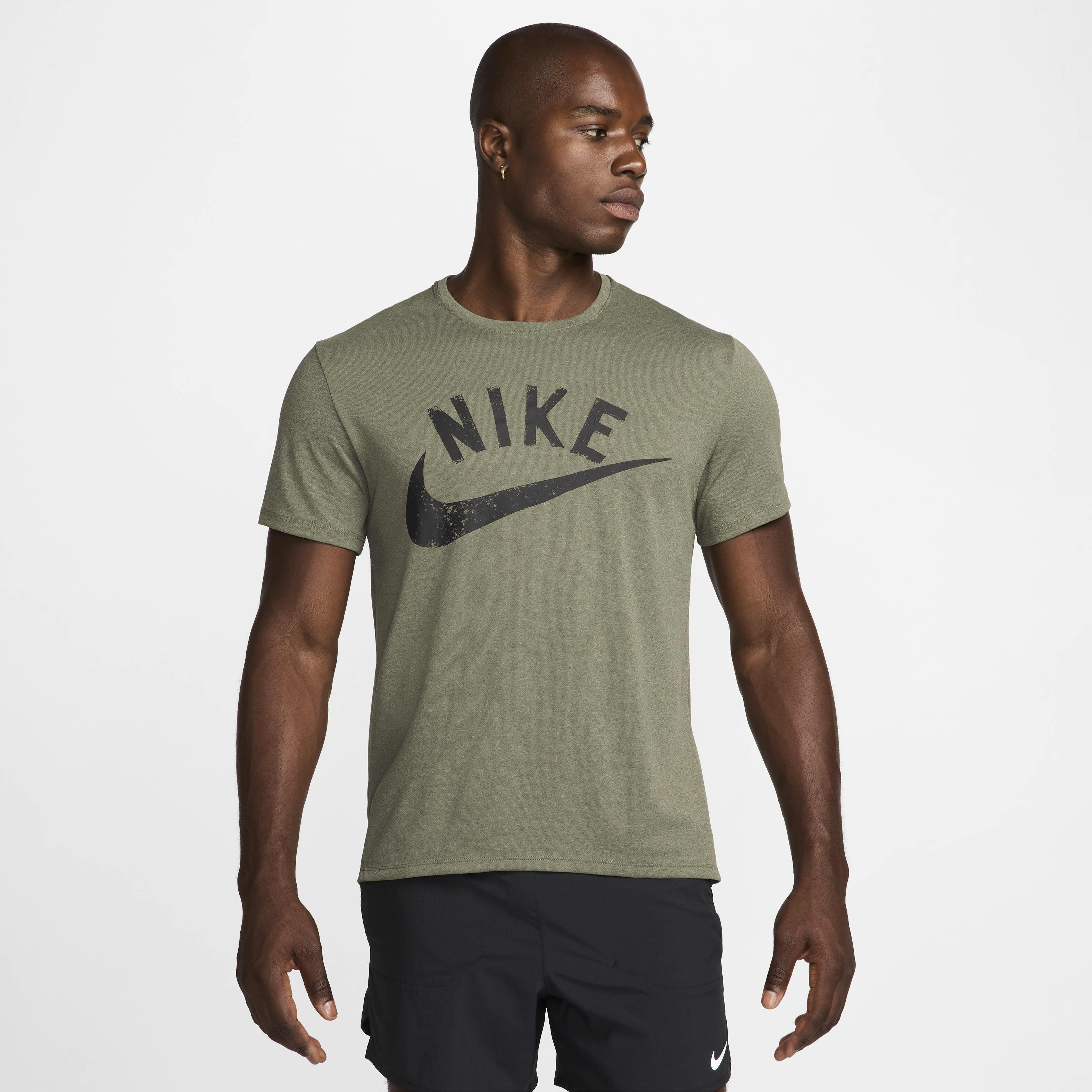 Buy Nike Miler Men s Dri FIT Short Sleeve Running Top Nike Saudi Official