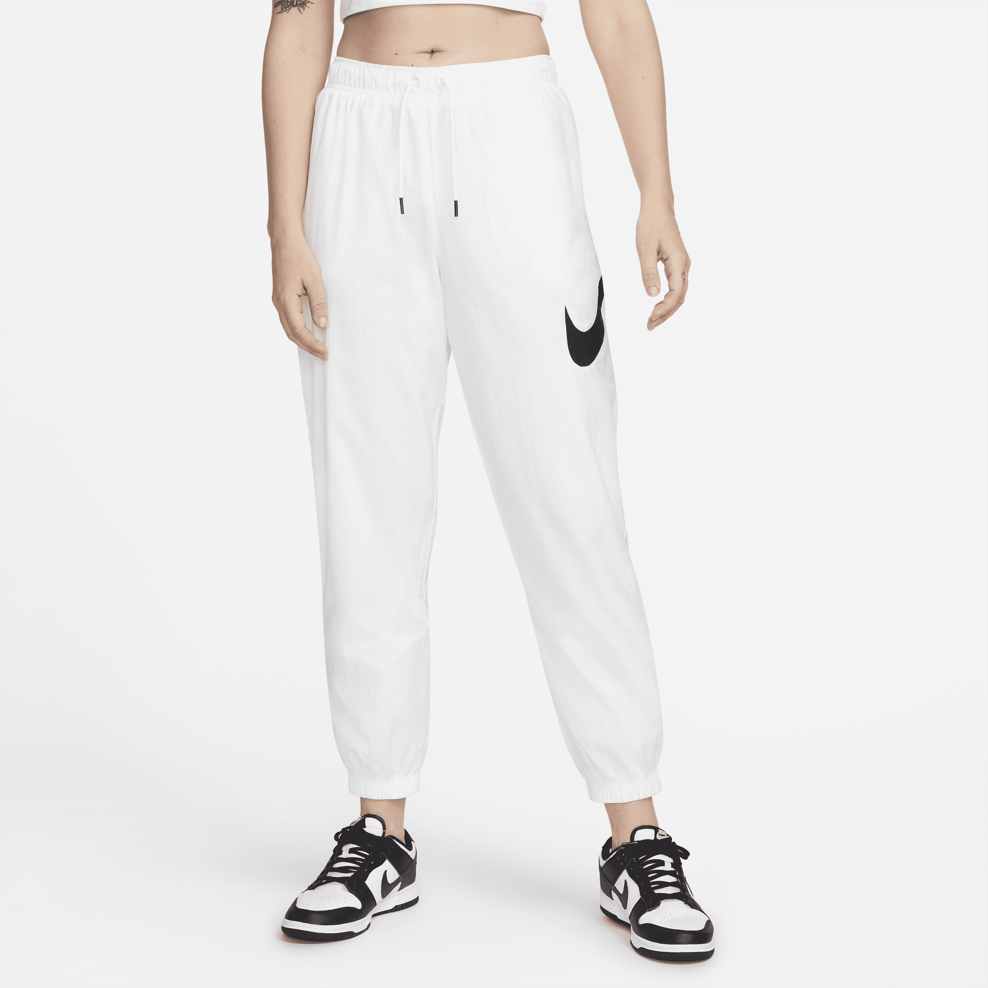 Nike swoosh on sale pants womens