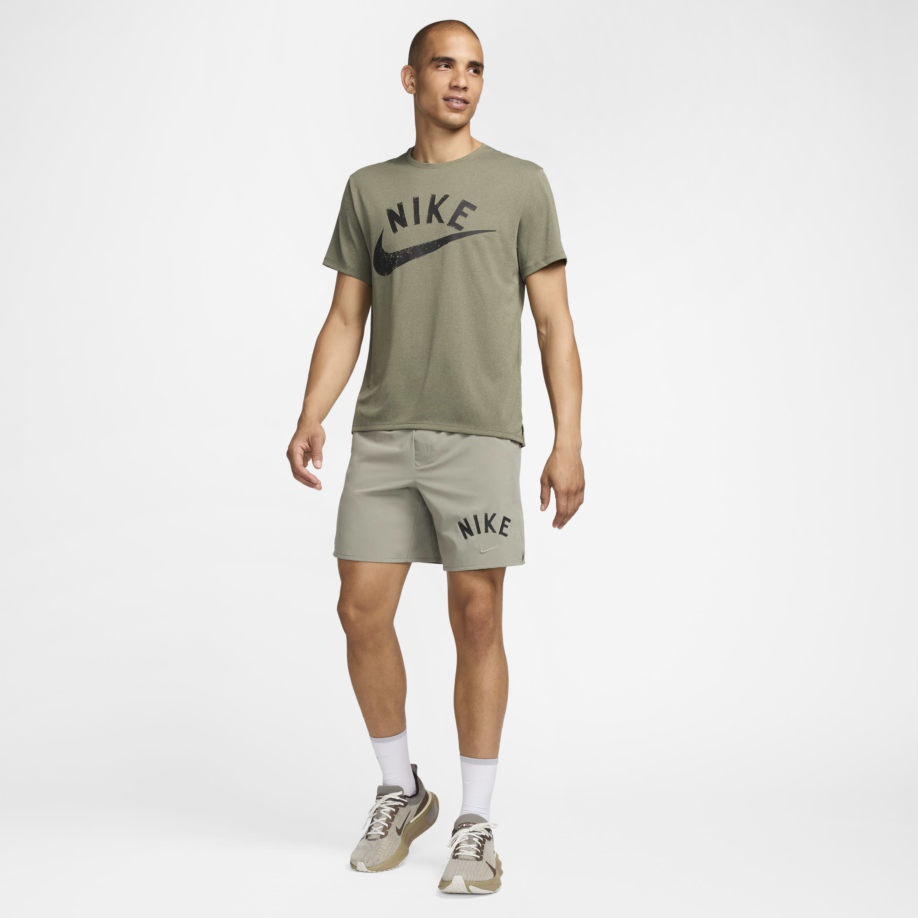 Buy Nike Unlimited Swoosh Men s 18cm approx. Dri FIT Unlined Versatile Shorts Nike Saudi Official
