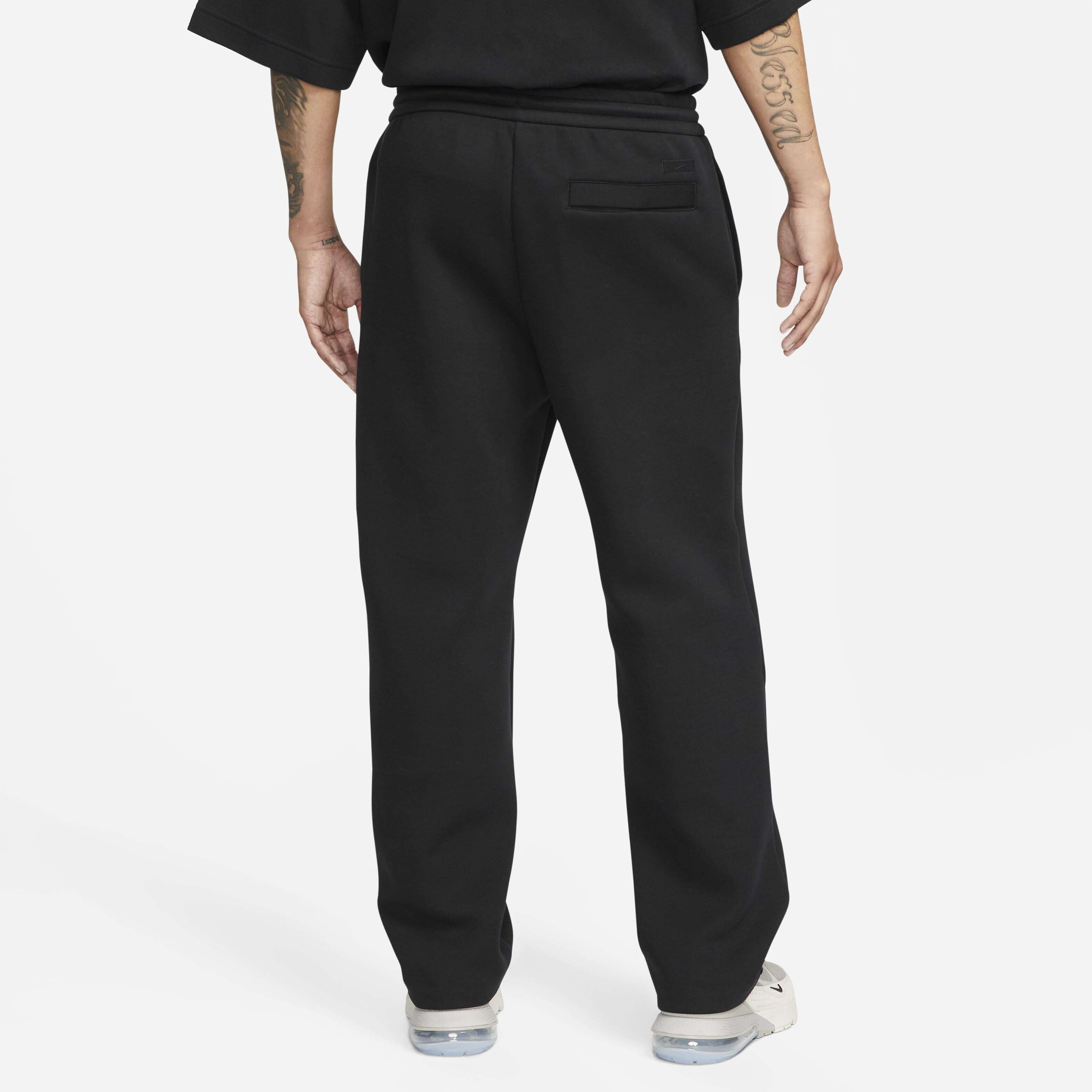 Black nike tech bottoms top