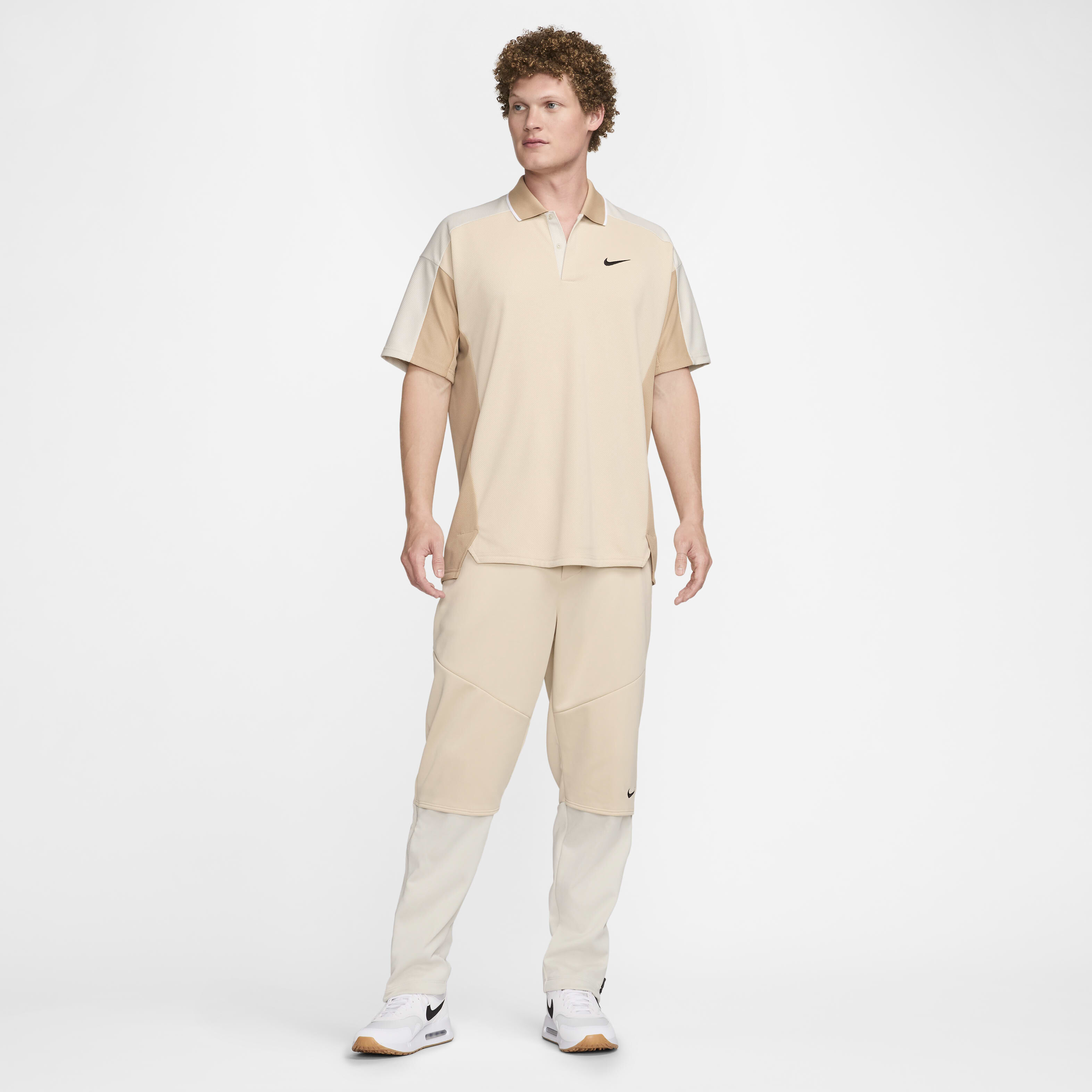 Nike golf shirt with golf clubs on it top