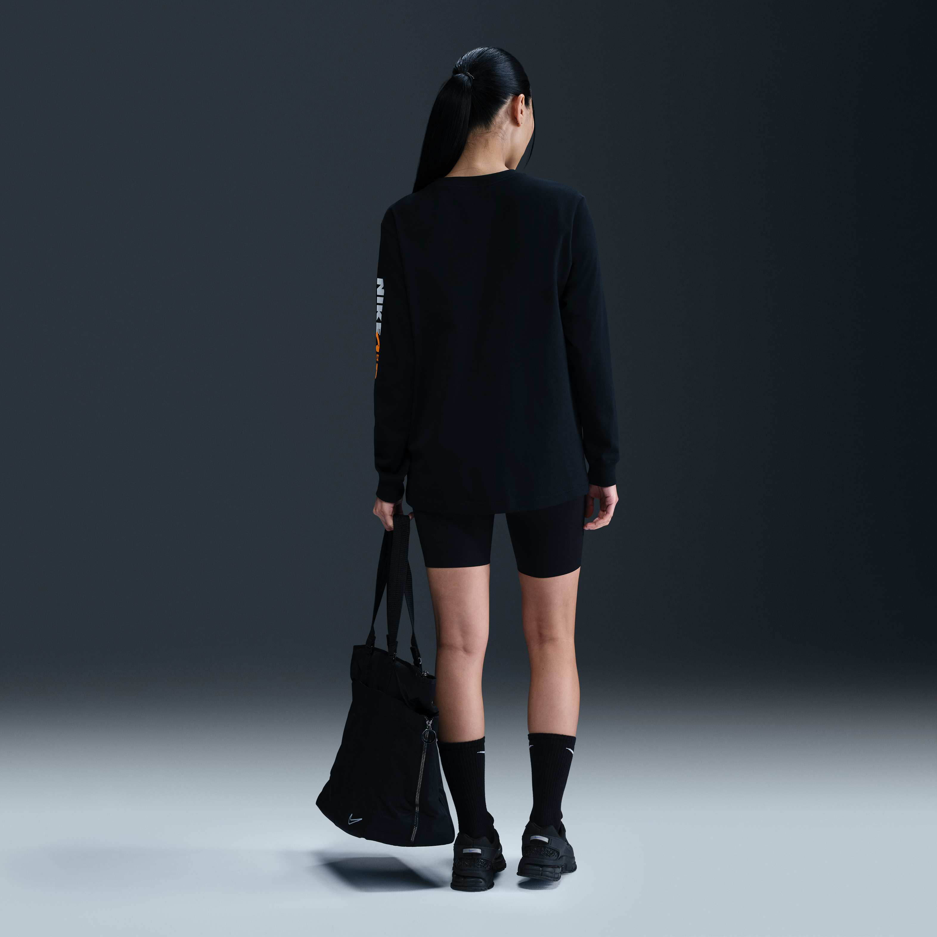 Buy Nike Sportswear Women's Loose Long-Sleeve Graphic T-Shirt