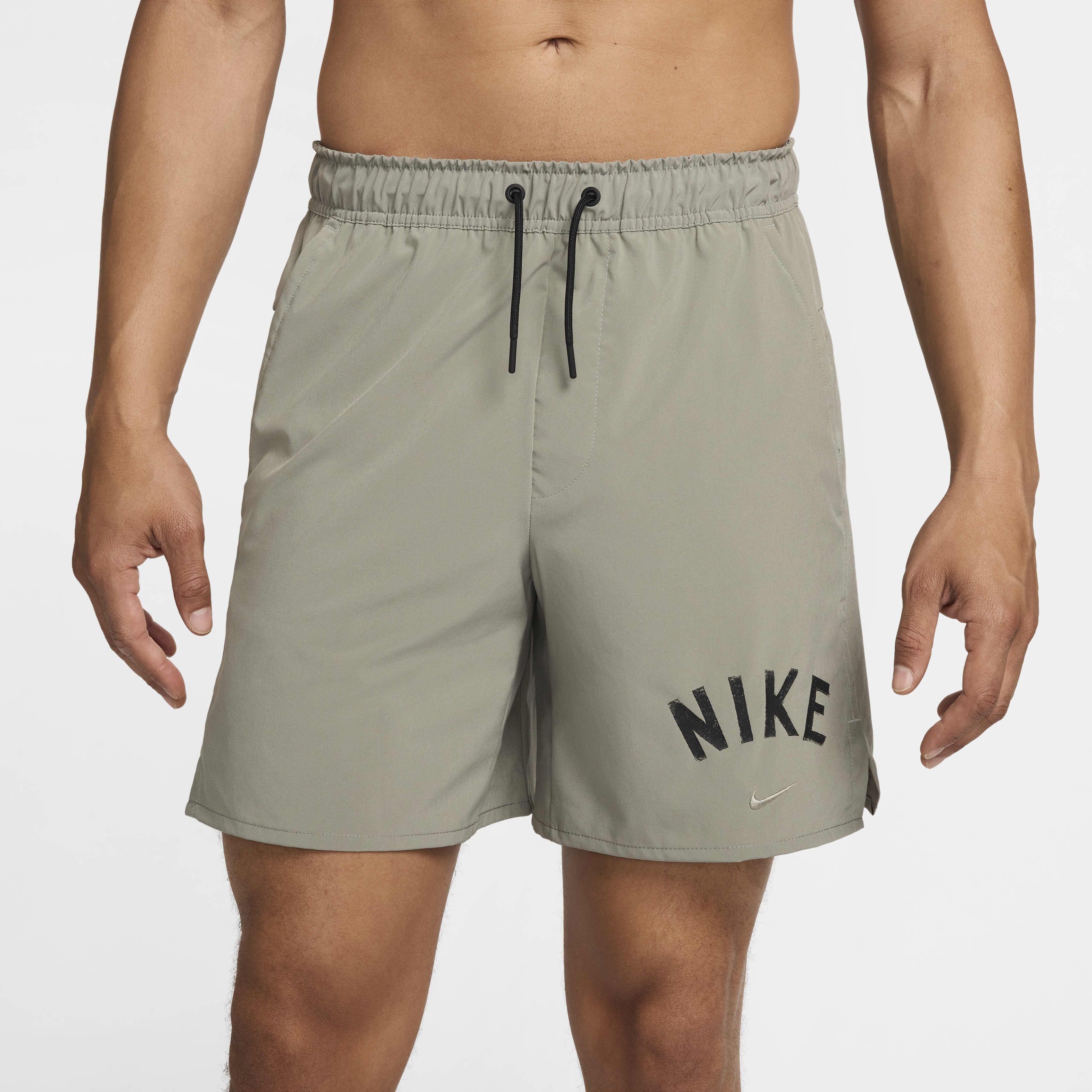 Buy Nike Unlimited Swoosh Men s 18cm approx. Dri FIT Unlined Versatile Shorts Dark Stucco Black Black Nike Saudi Official