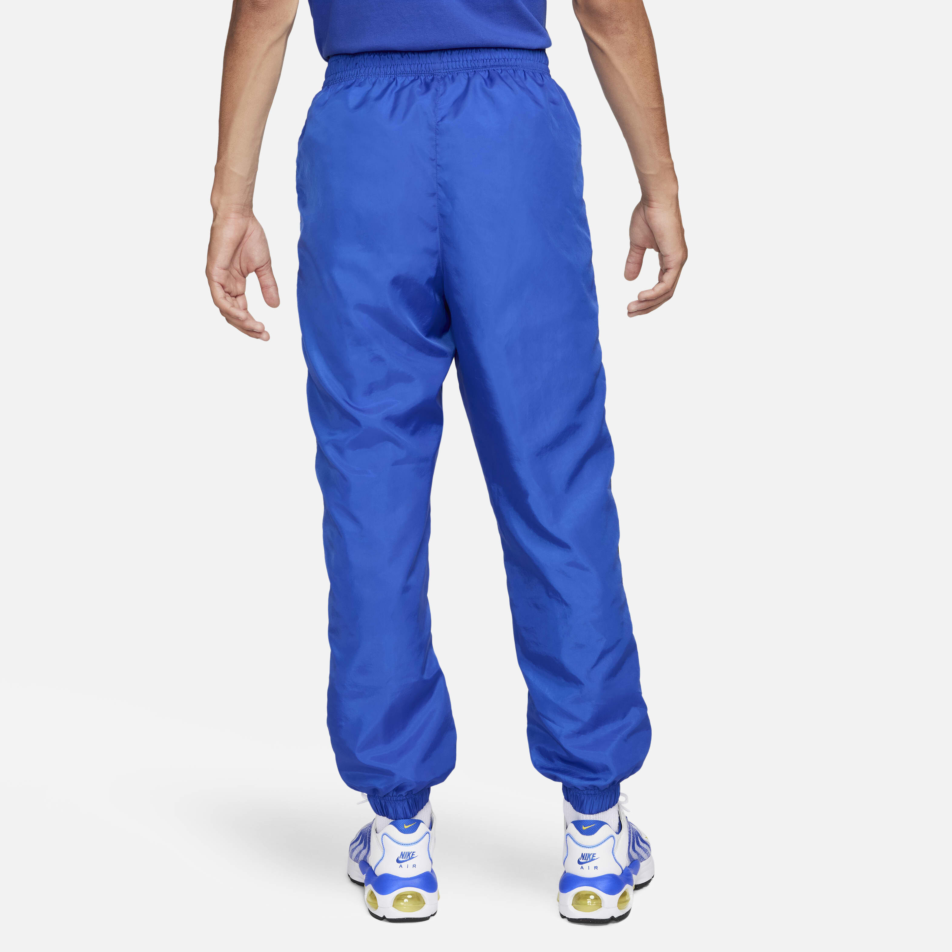 Buy Nike Sportswear Men s Woven Trousers Game Royal White Nike Saudi Official