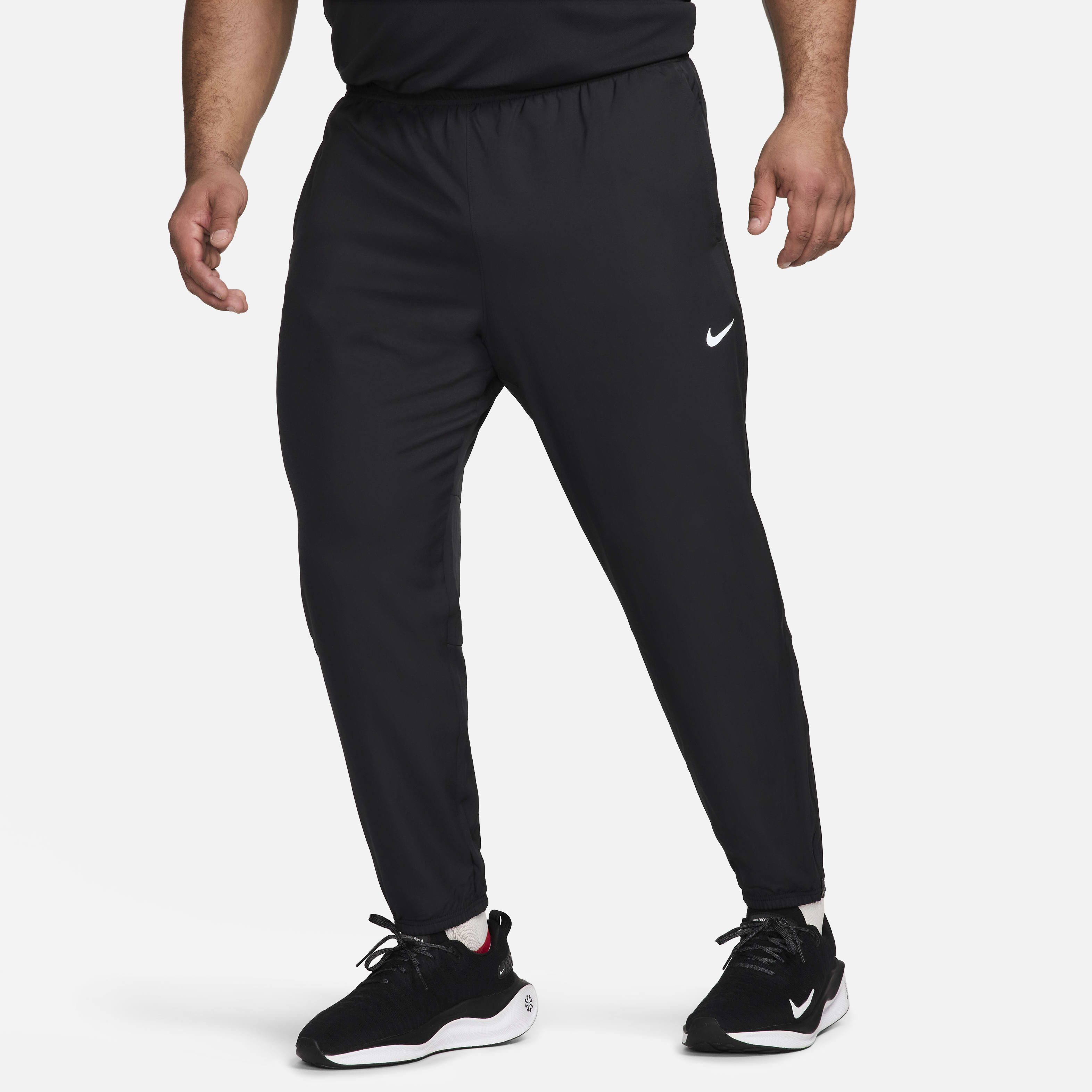 Buy Nike Challenger Men s Dri FIT Woven Running Trousers Nike Saudi Official