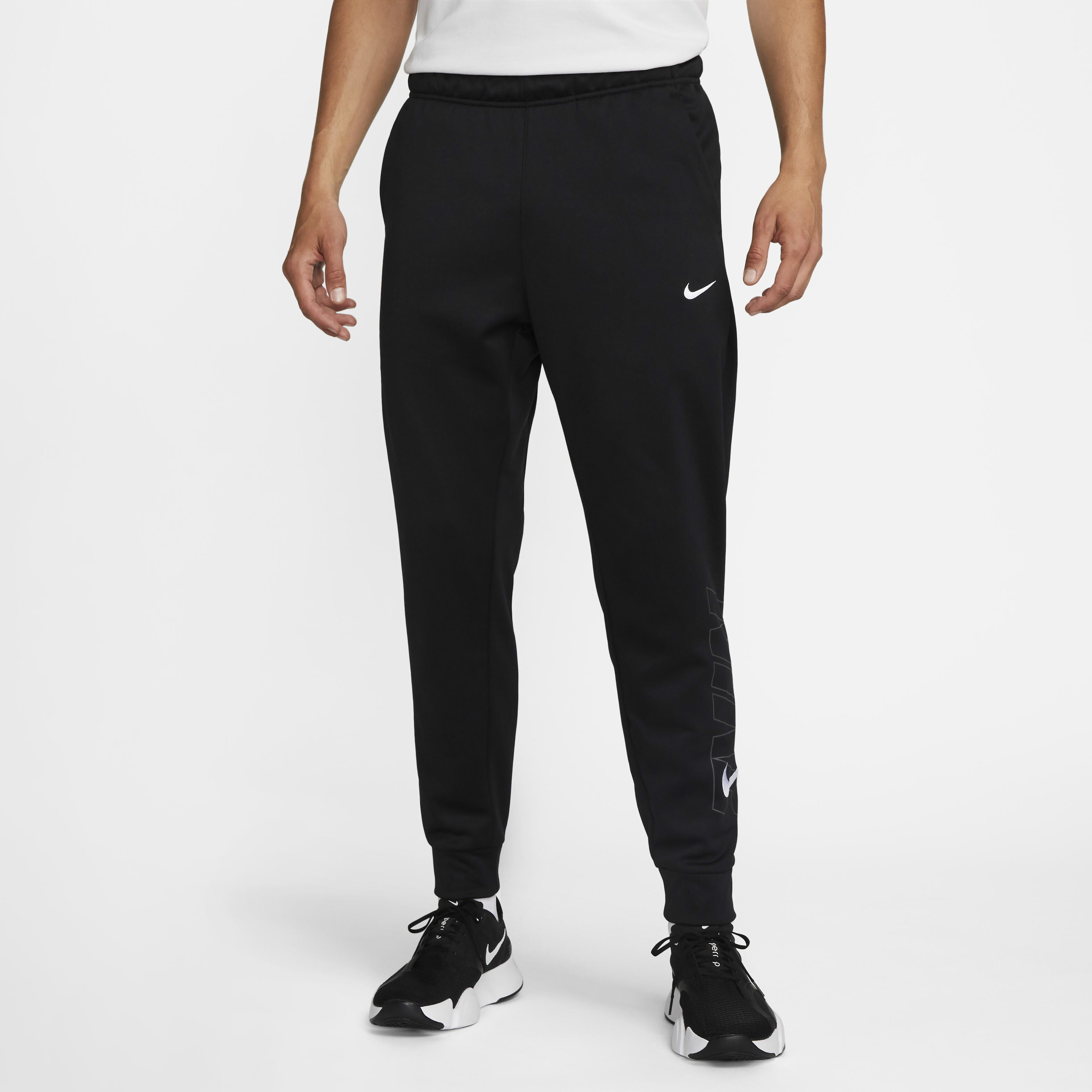 Buy Nike Therma FIT Men s Tapered Fitness Trousers Nike Saudi Official
