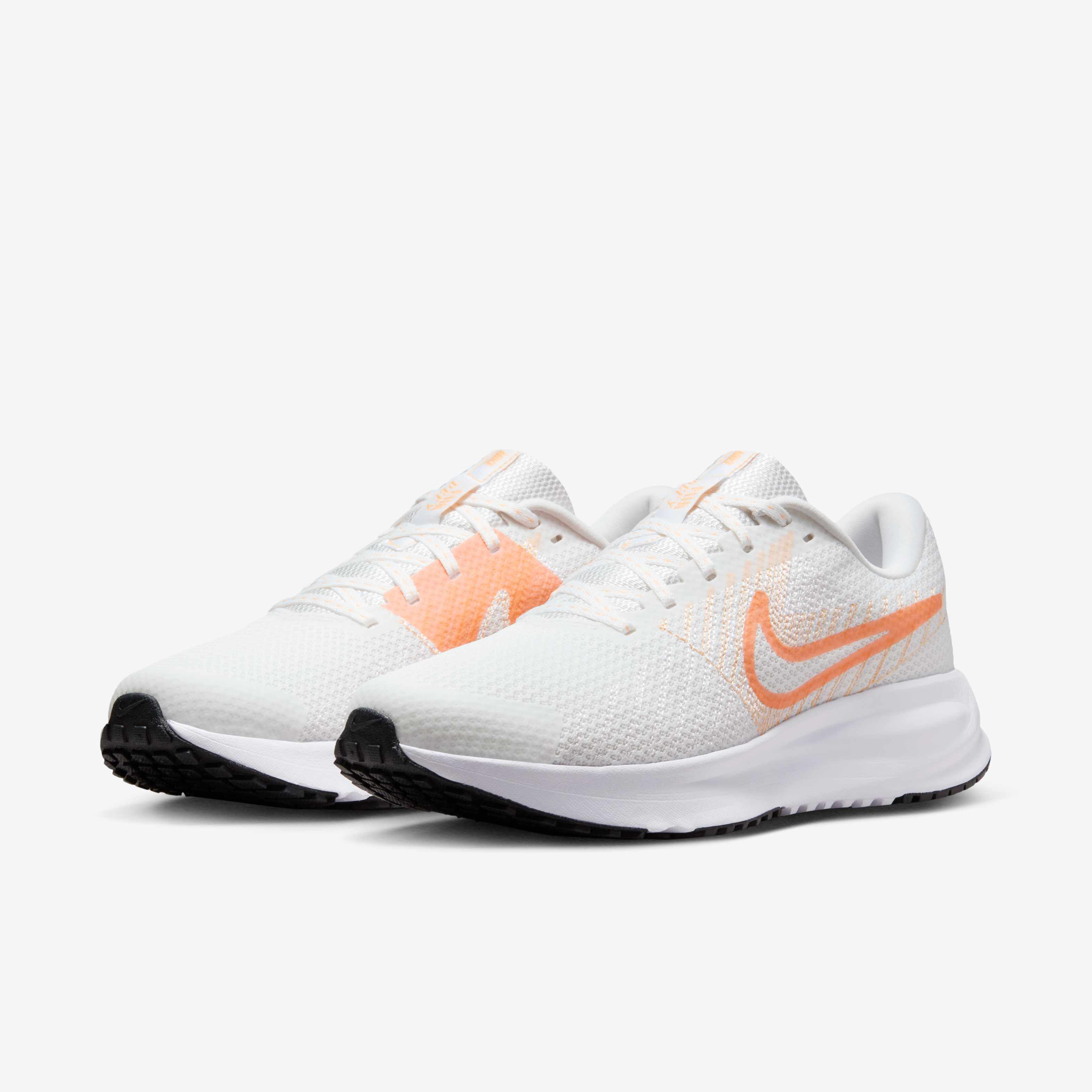 nike white orange sports shoes