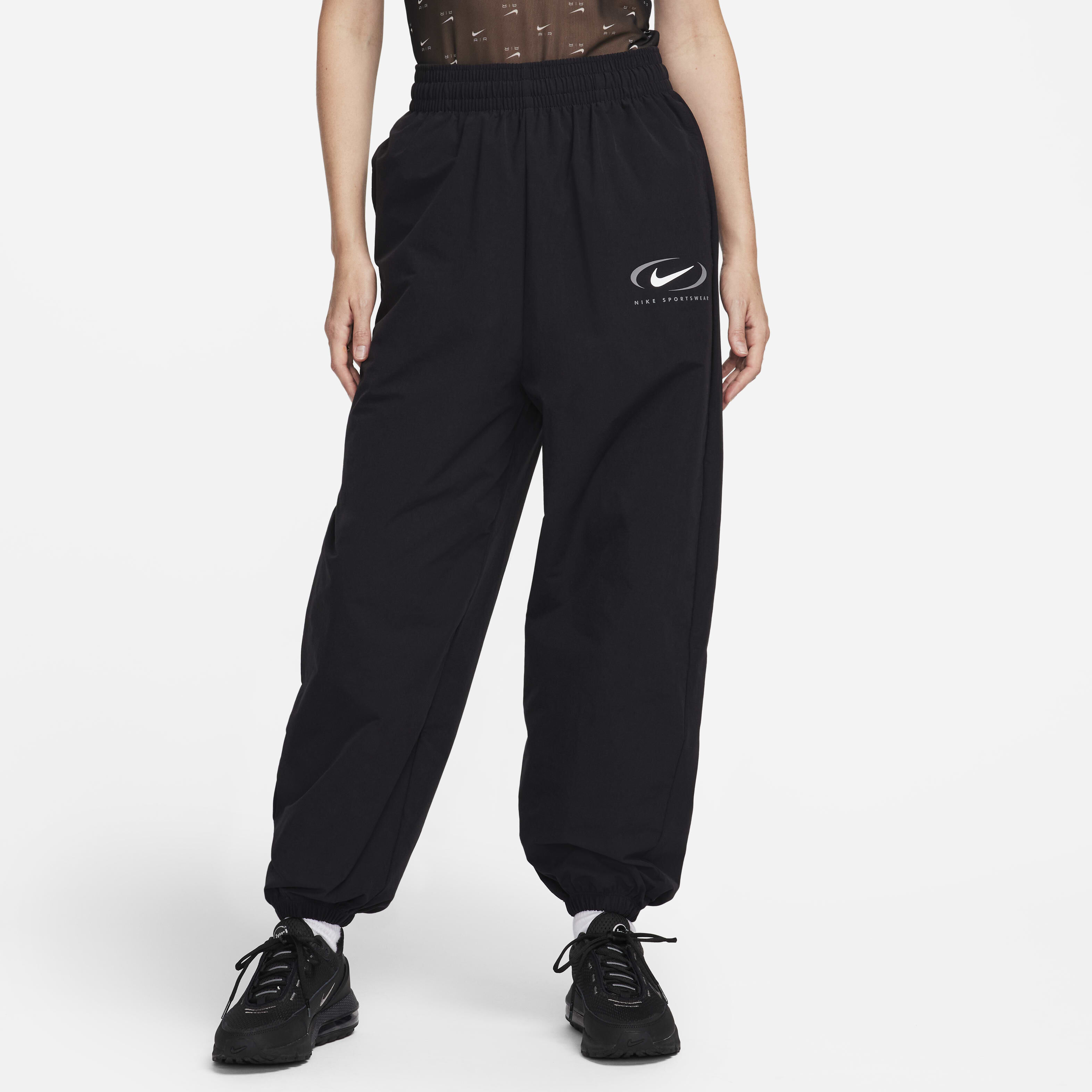 Buy Nike Sportswear Women s Woven Joggers Nike Saudi Official