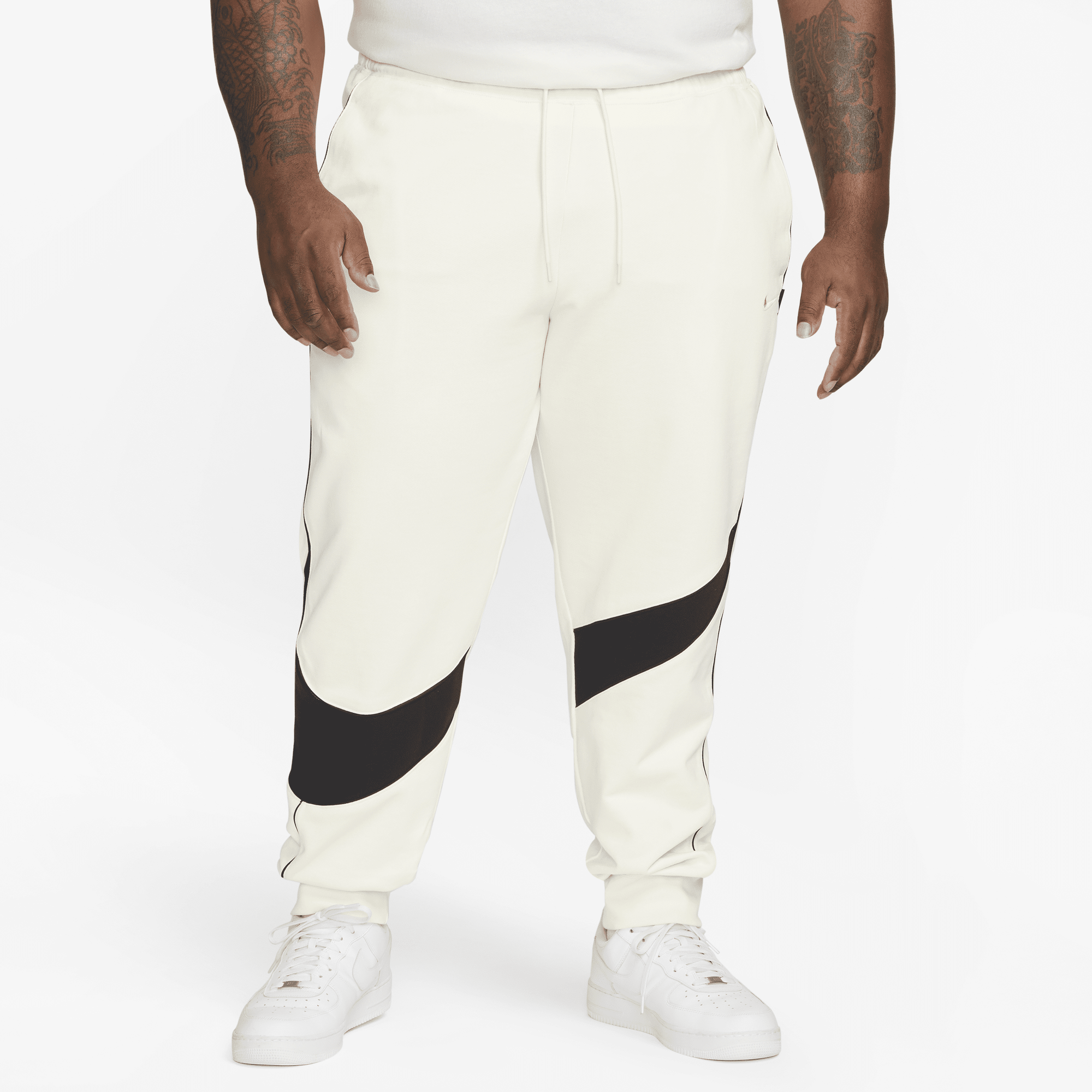 Nike swoosh 2025 windbreaker pants