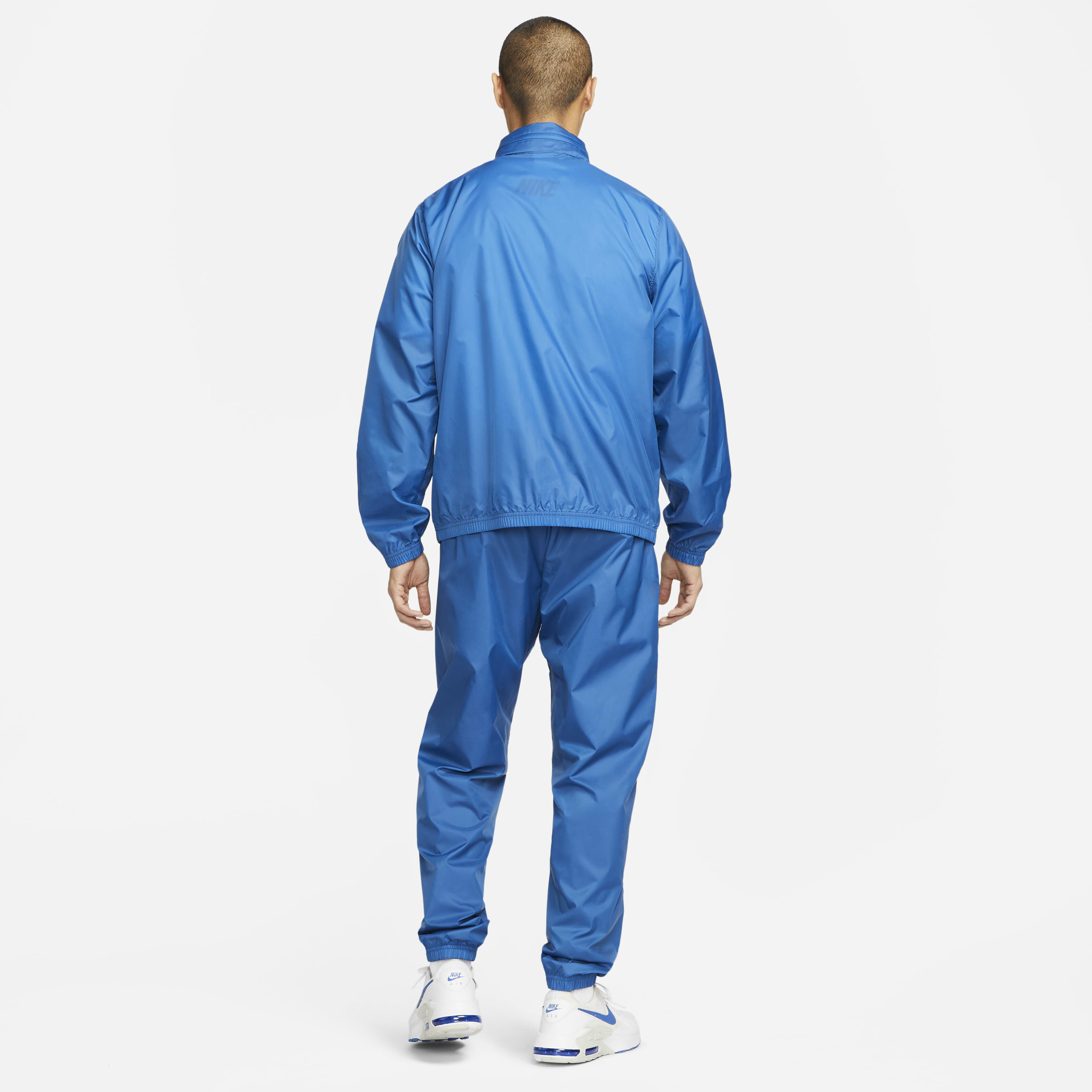 Buy Nike Sportswear Club Men s Lined Woven Tracksuit Nike Saudi Official