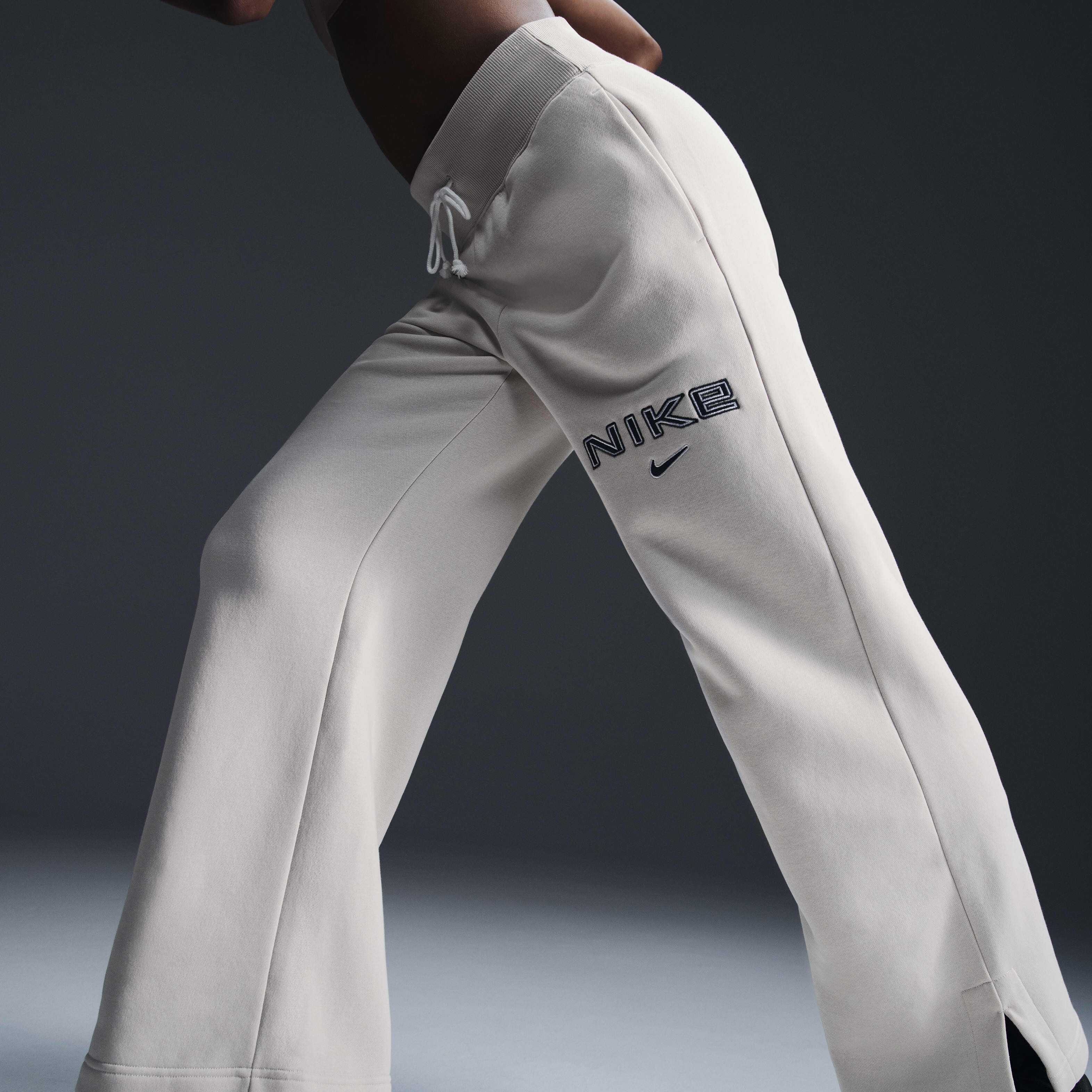 Buy Nike Sportswear Phoenix Fleece Women s High Waisted Wide Leg Logo Trousers Nike Saudi Official