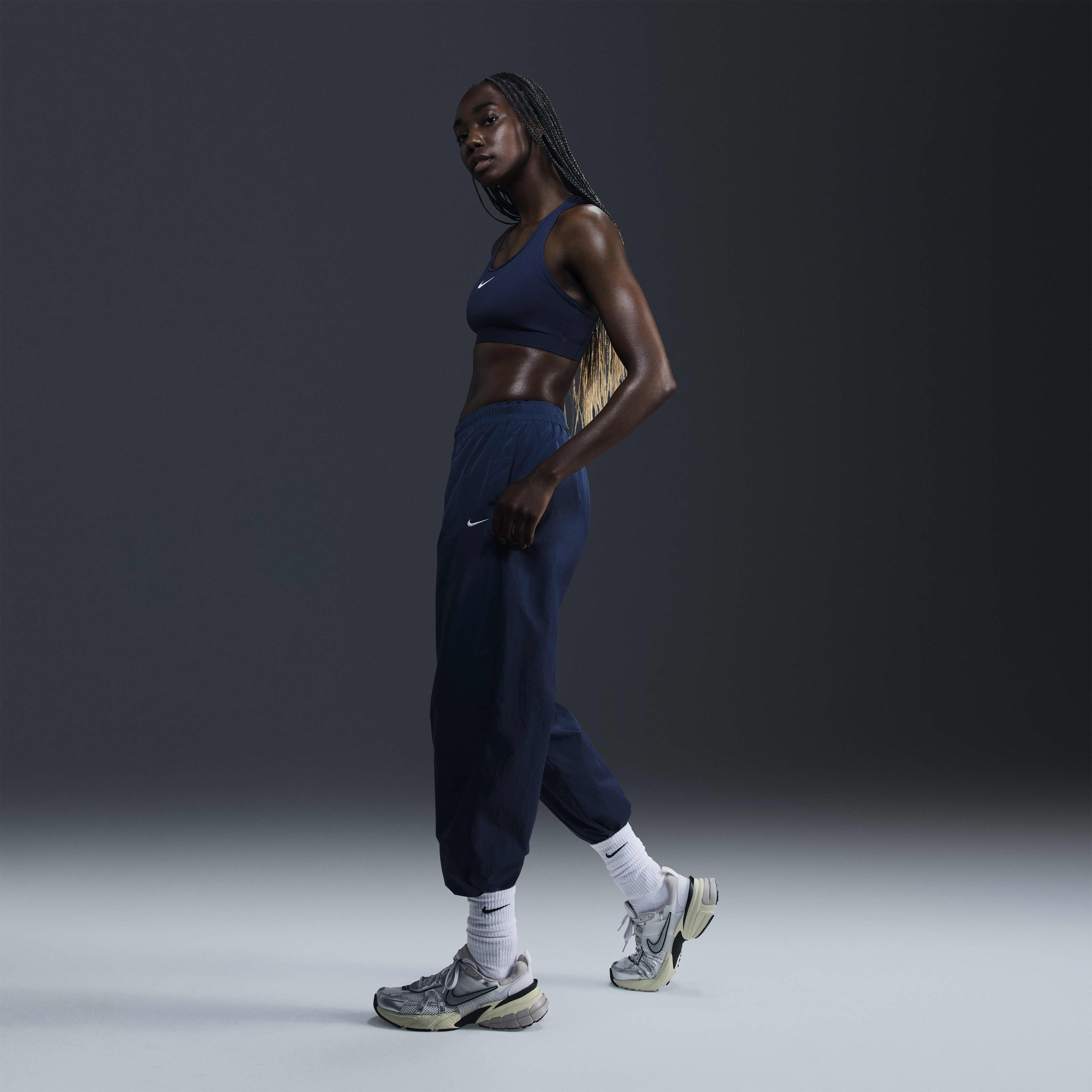 Buy Nike Sportswear Essential Women s Mid Rise Oversized Woven Joggers Nike Saudi Official