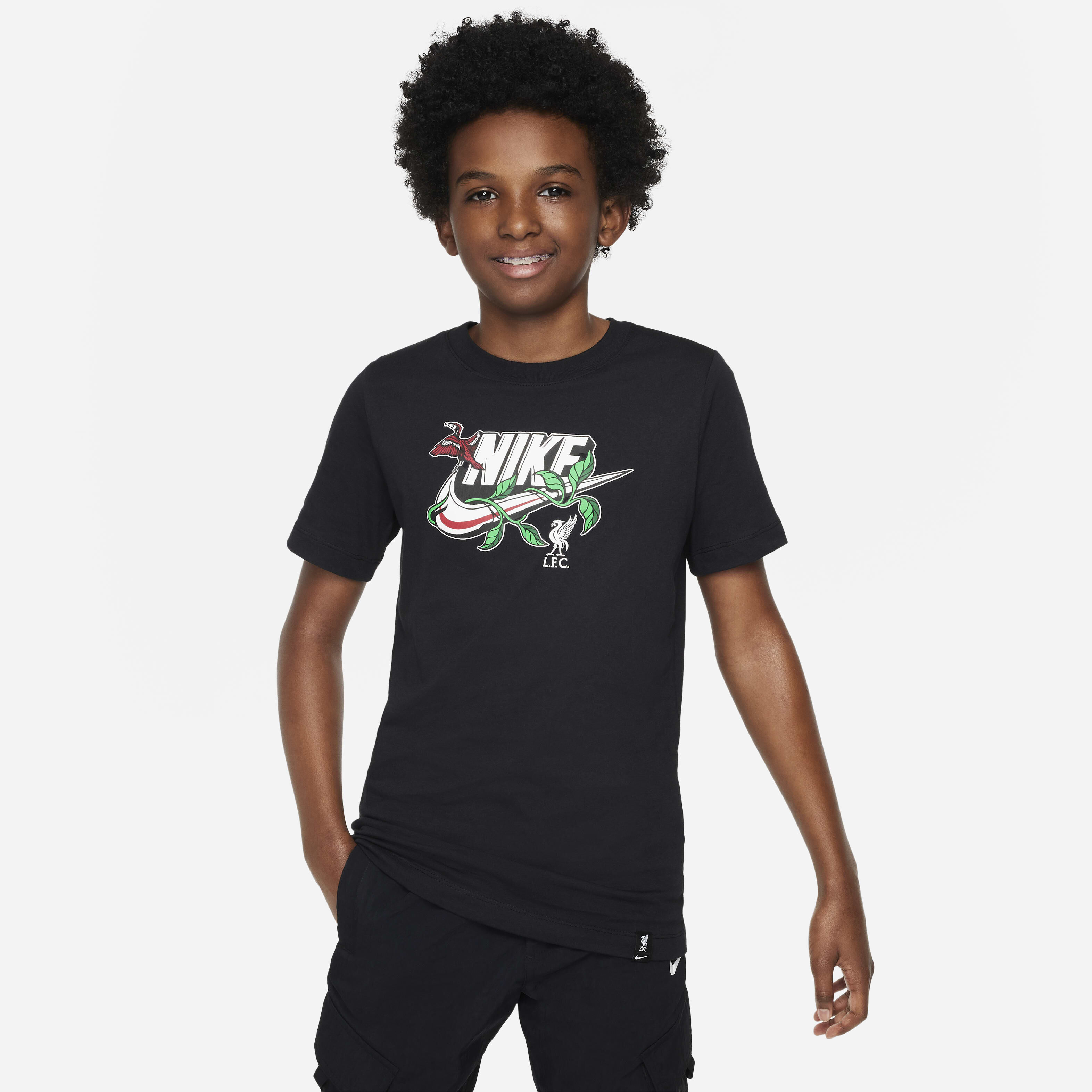Buy Liverpool F.C. Older Kids' Nike T-Shirt - Black | Nike