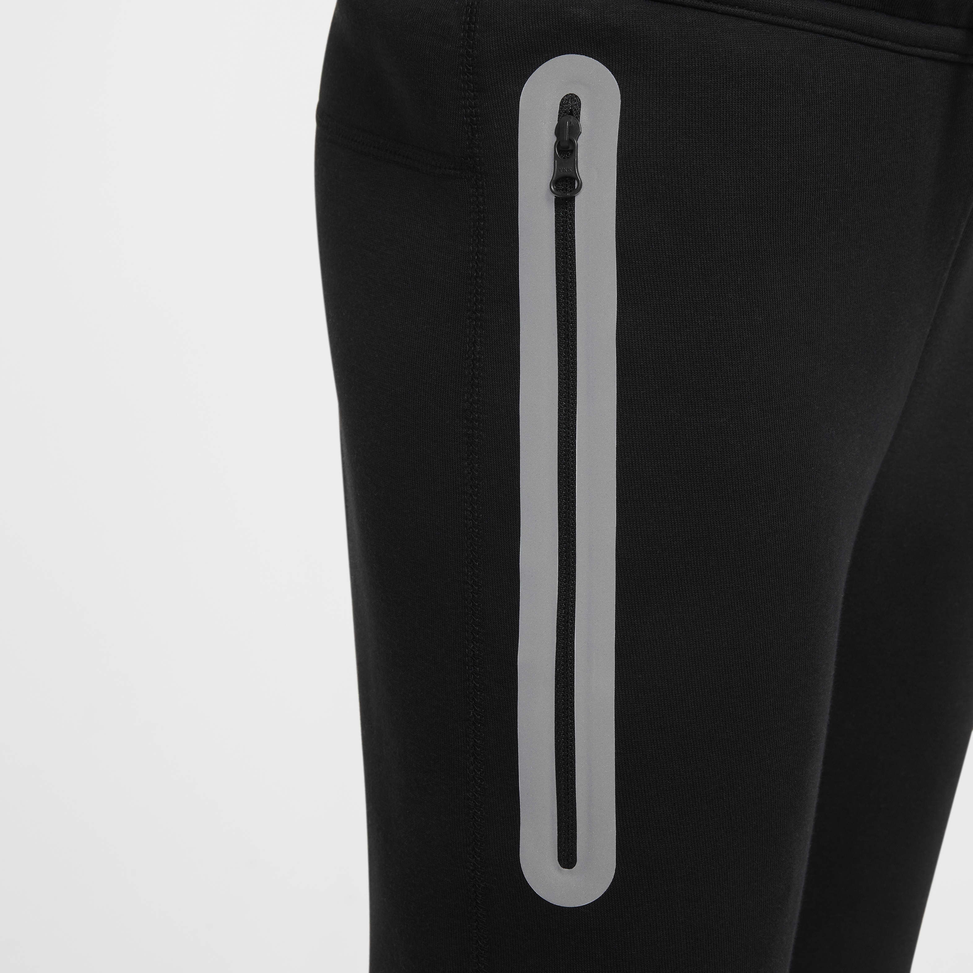 Nike tech pants reflective sale