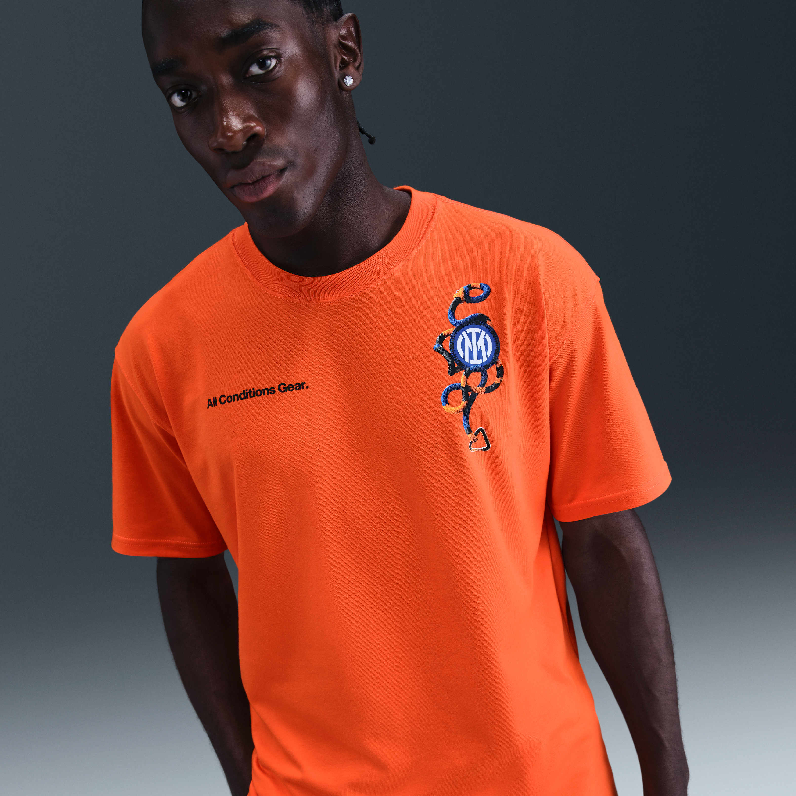 atomic orange nike shirt