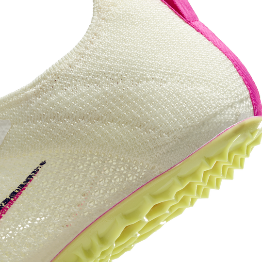 Yellow and 2025 pink nike spikes