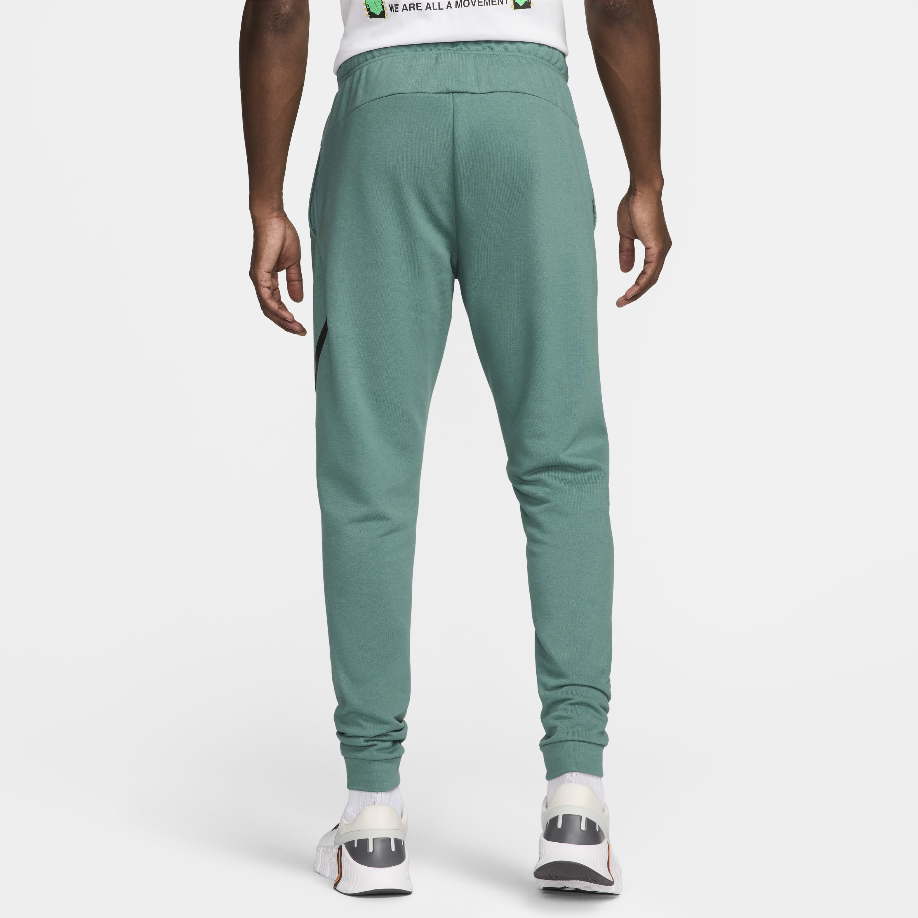 Buy Nike Dry Graphic Men s Dri FIT Taper Fitness Trousers Nike Saudi Official